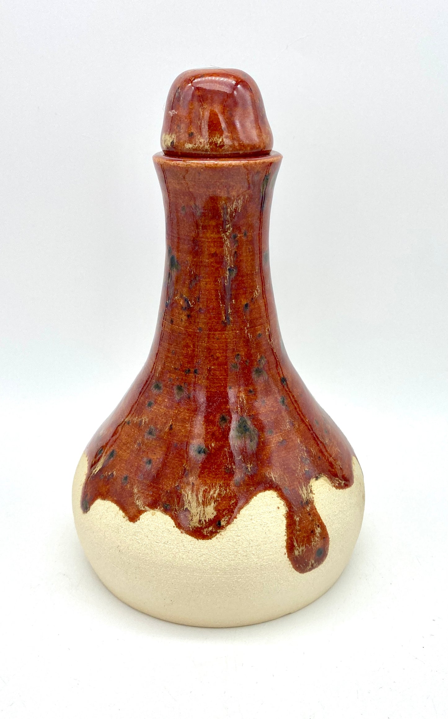 Burnt orangey red decanter