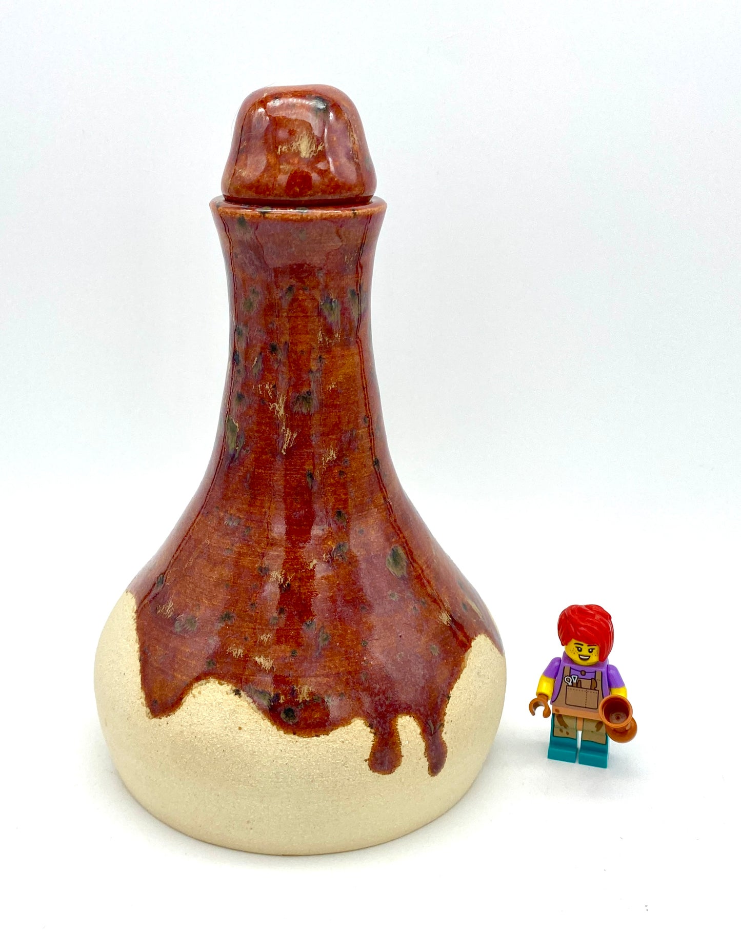 Burnt orangey red decanter