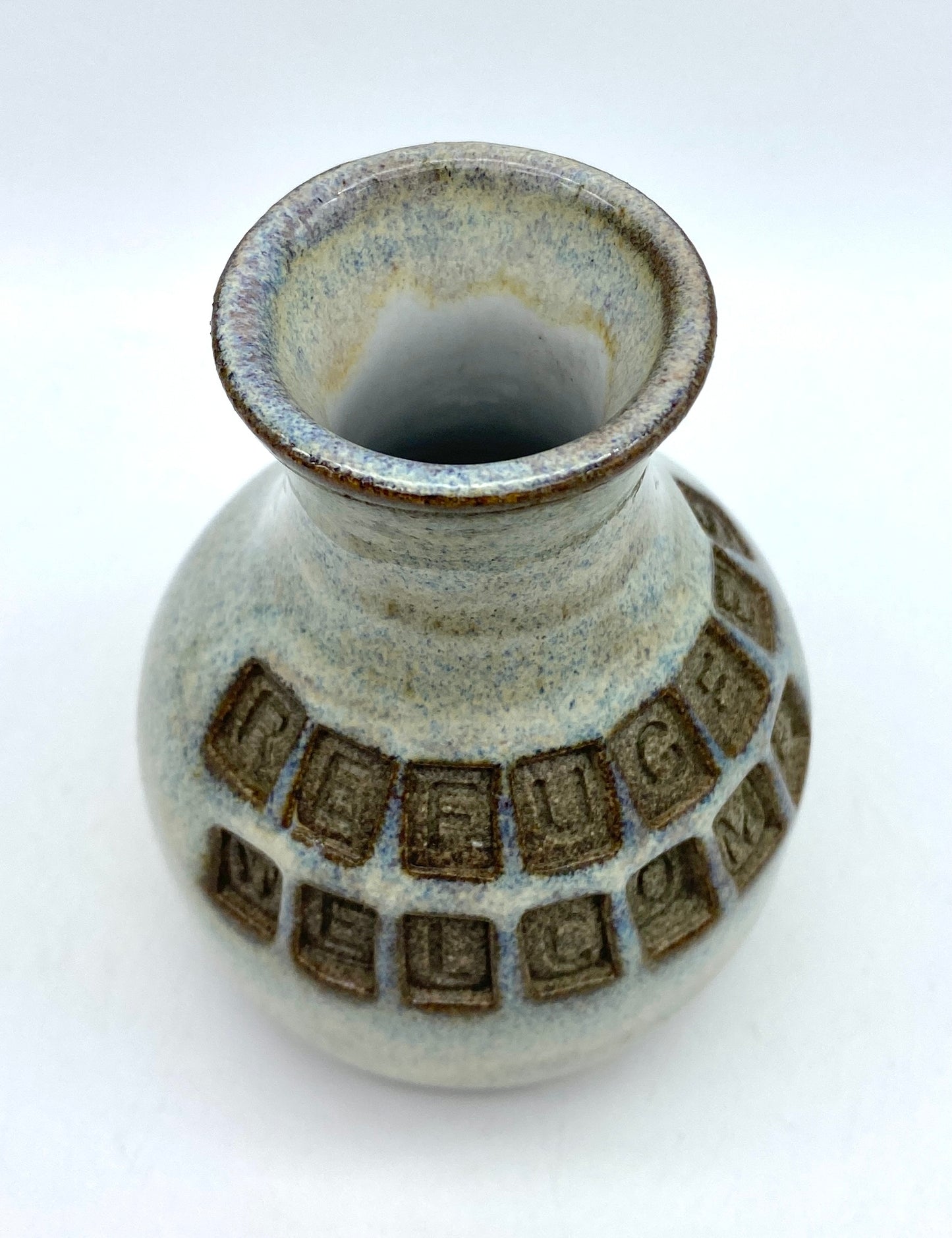 'Refugees welcome' little bud vase in special Scandi clay