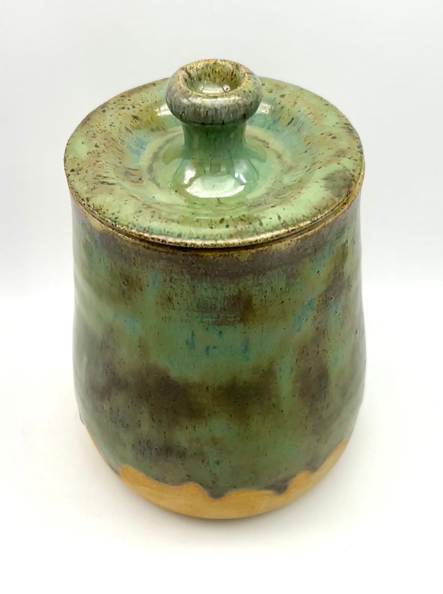 SECOND Tall lidded pot in toasty clay with green glazes