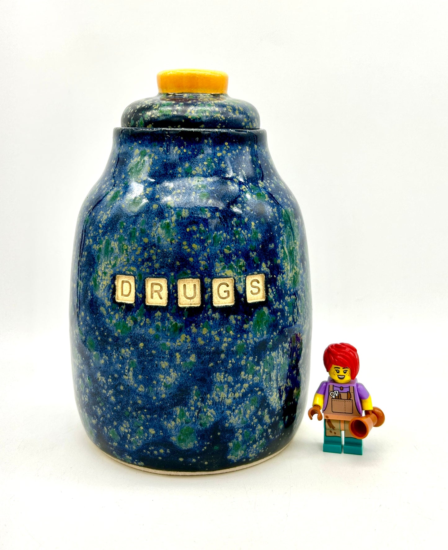 'Drugs' lidded jar in brilliant galaxy glazes