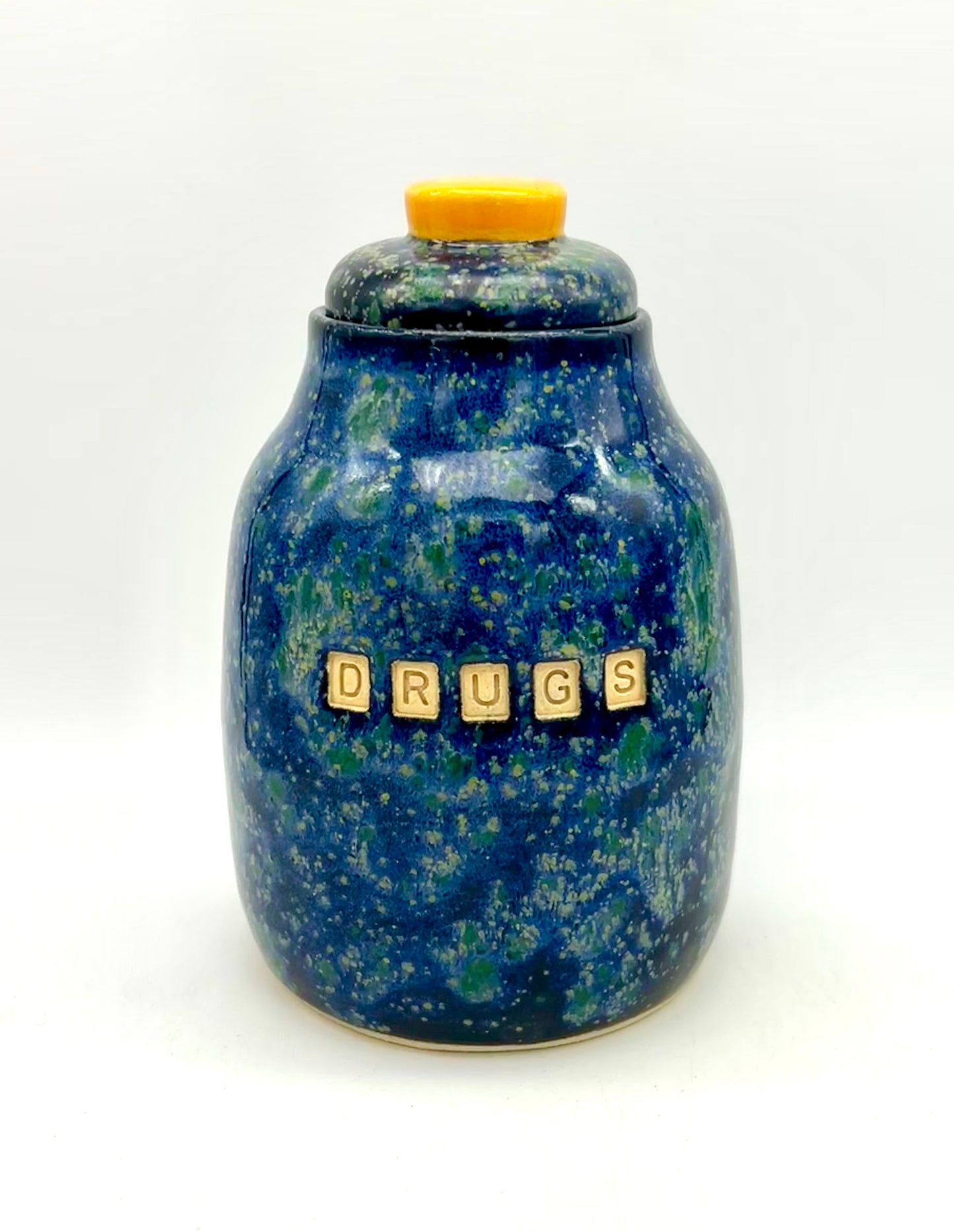 'Drugs' lidded jar in brilliant galaxy glazes