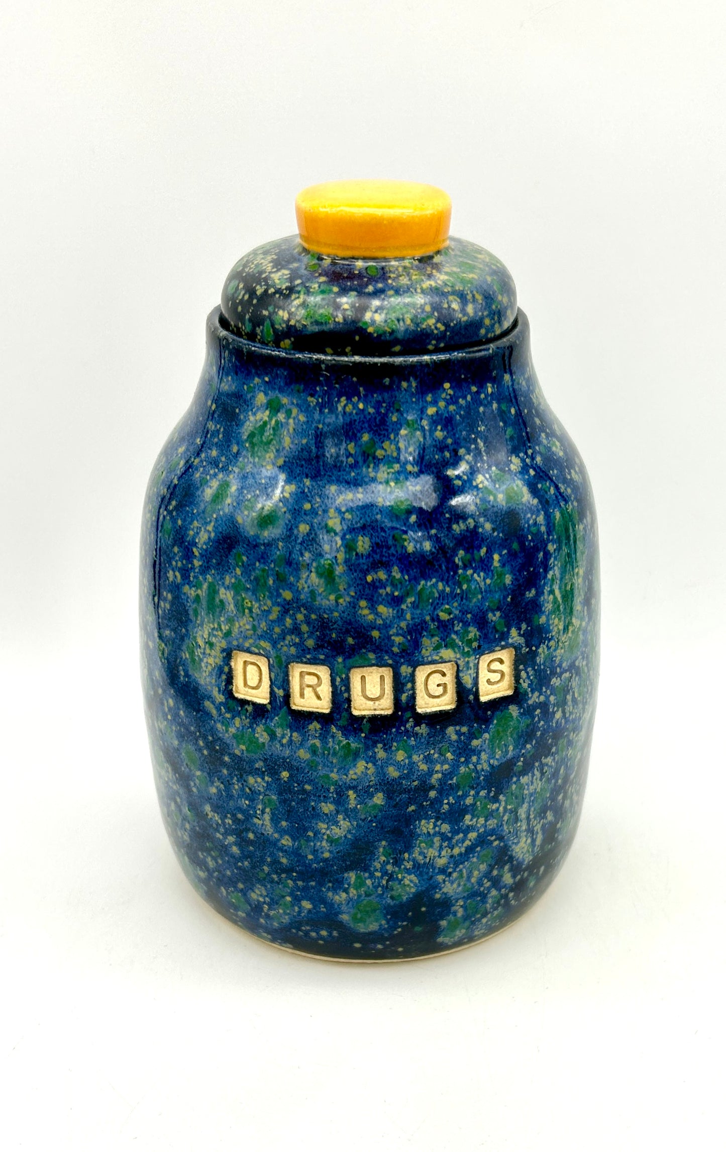 'Drugs' lidded jar in brilliant galaxy glazes