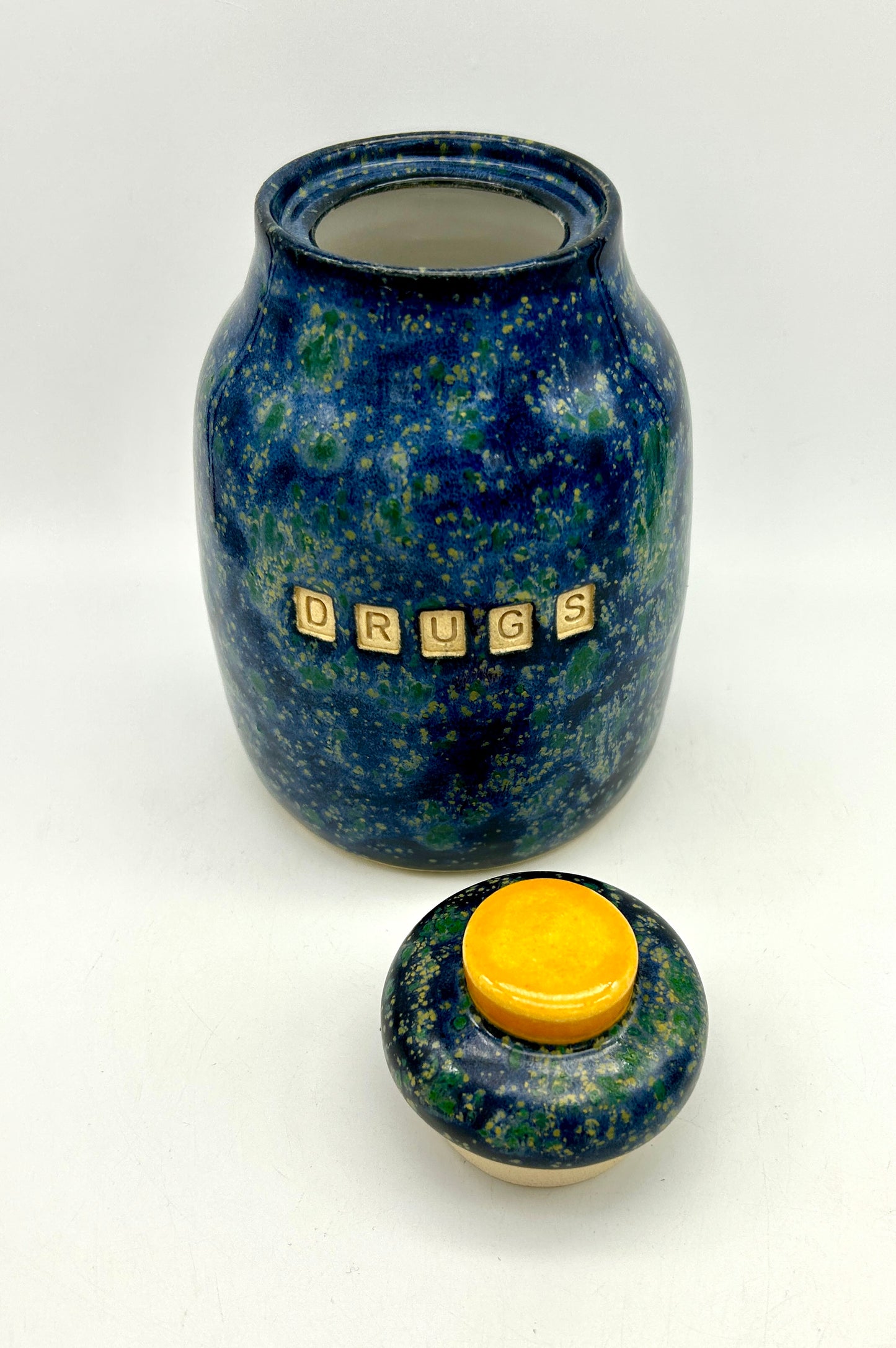 'Drugs' lidded jar in brilliant galaxy glazes