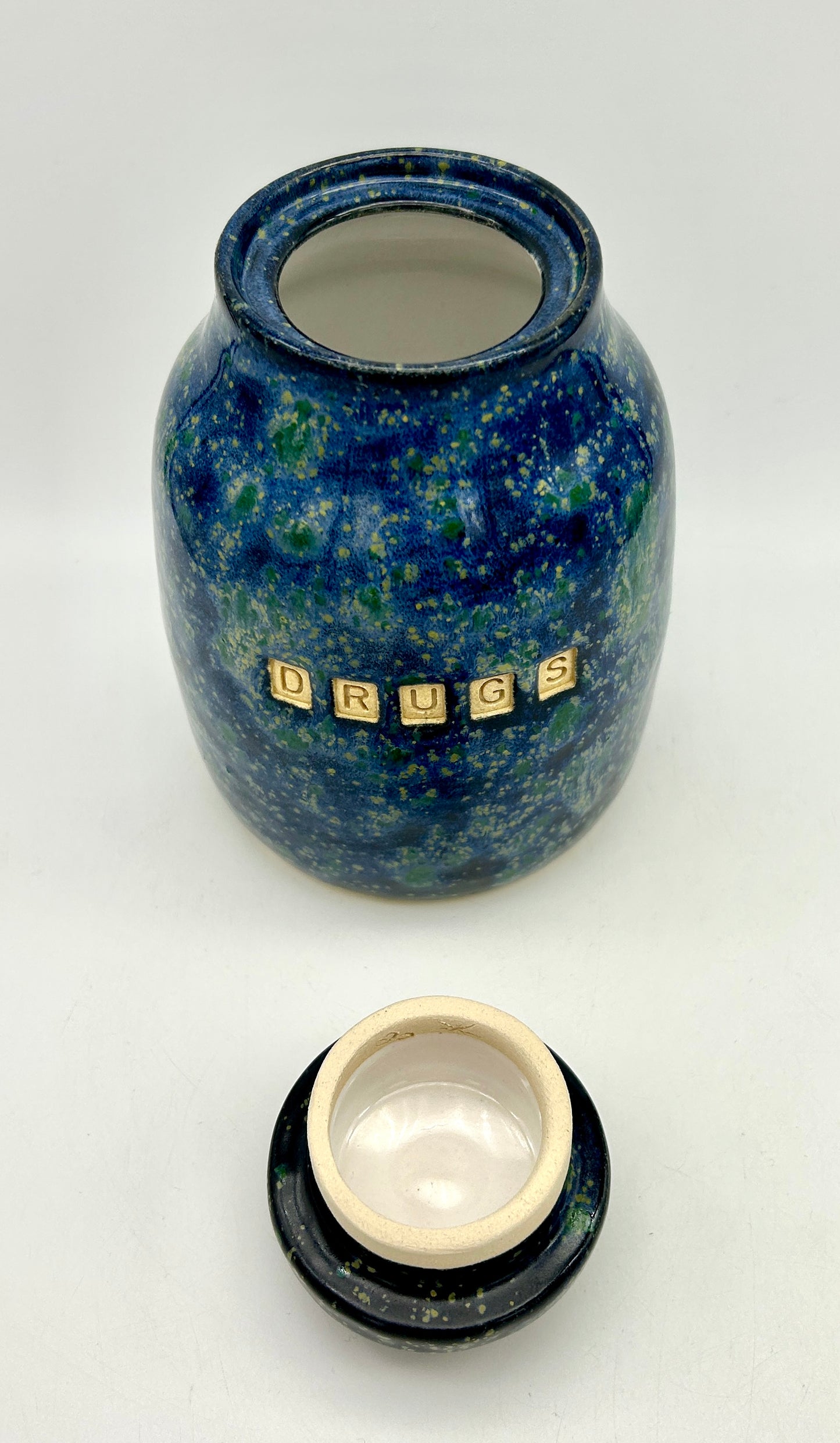 'Drugs' lidded jar in brilliant galaxy glazes