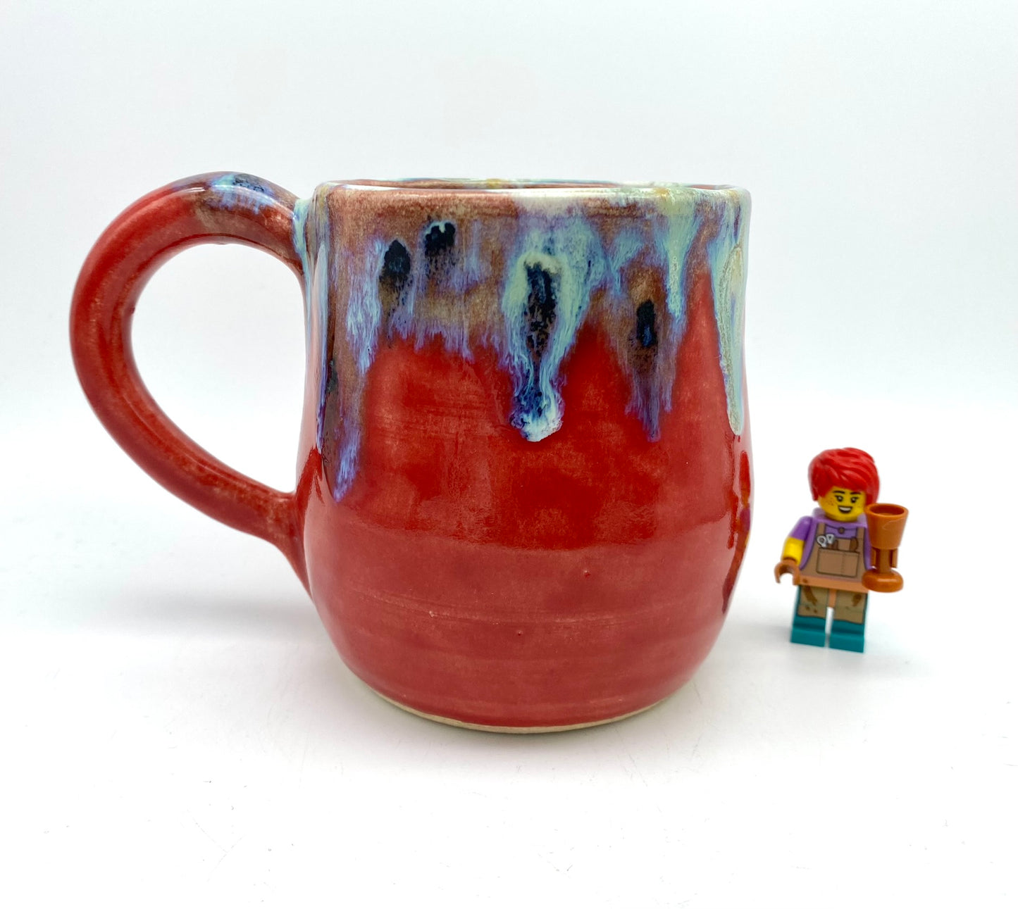 Vibrant mug with dramatic glazes