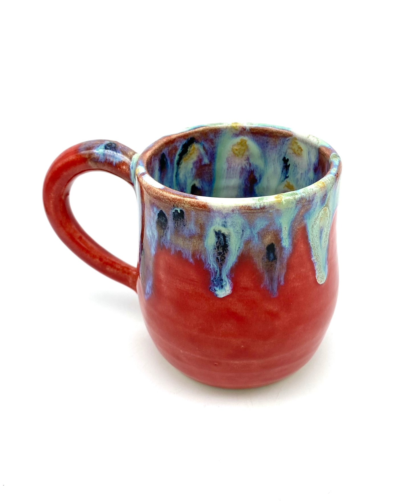 Vibrant mug with dramatic glazes