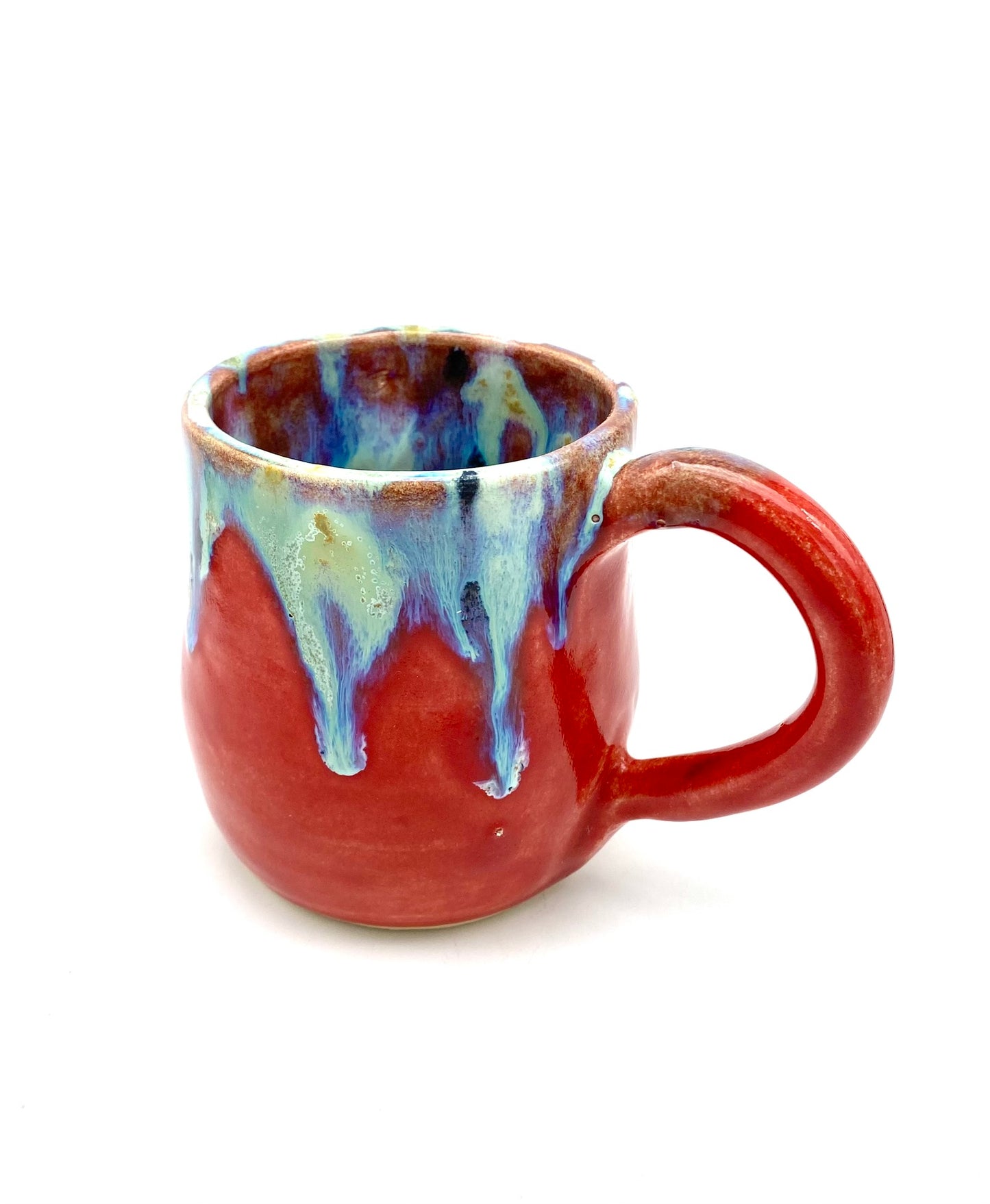 Vibrant mug with dramatic glazes