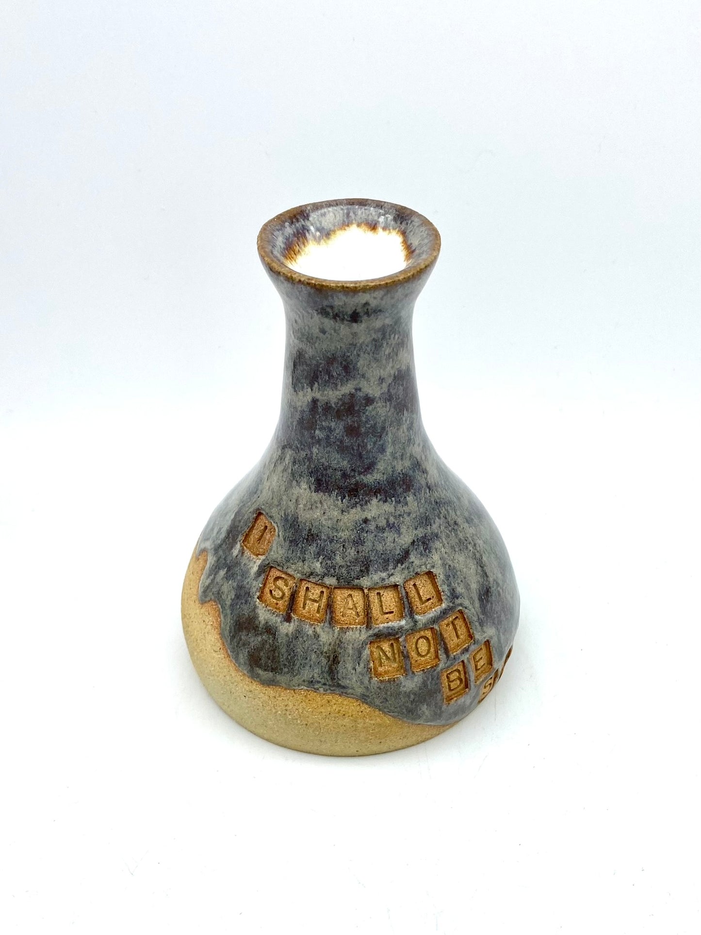 'I shall not be shaken' bud vase