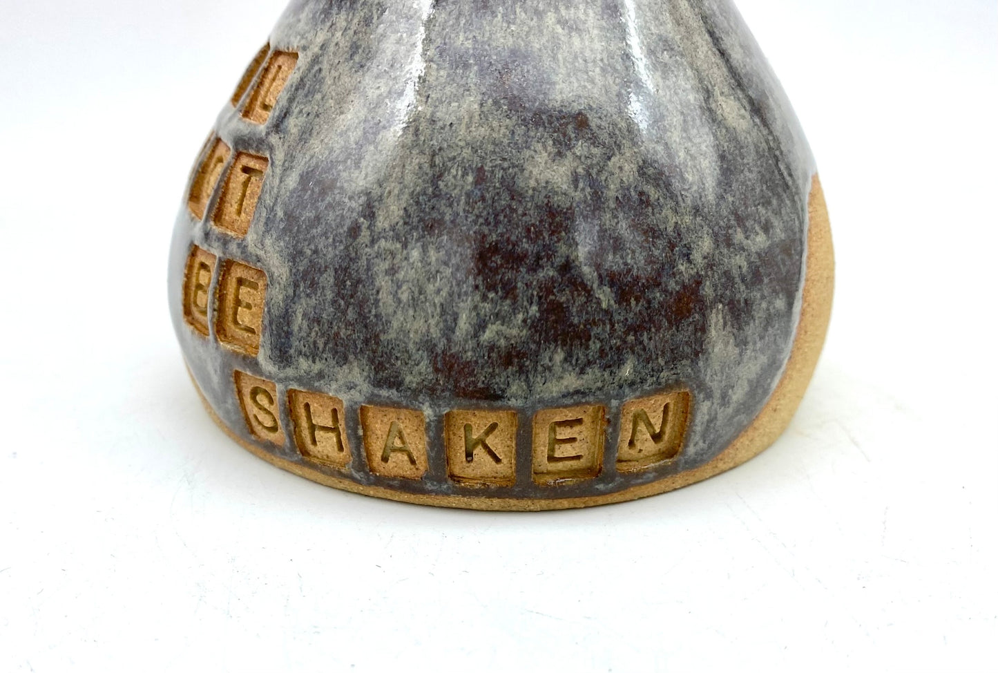 'I shall not be shaken' bud vase