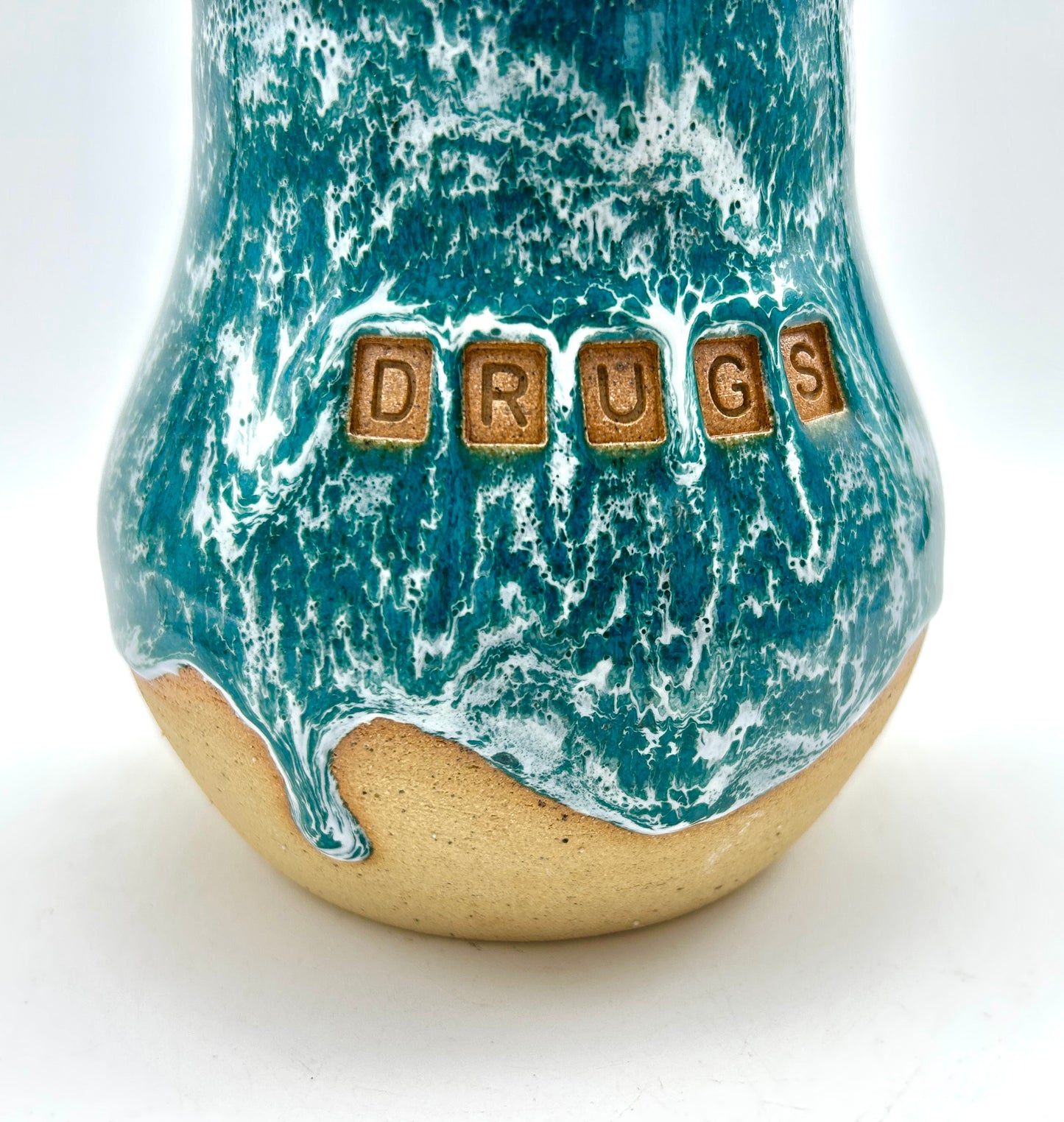 'Drugs' lidded jar in frosted jade glazes