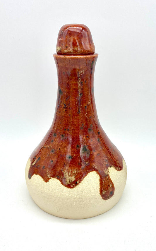 Burnt orangey red decanter