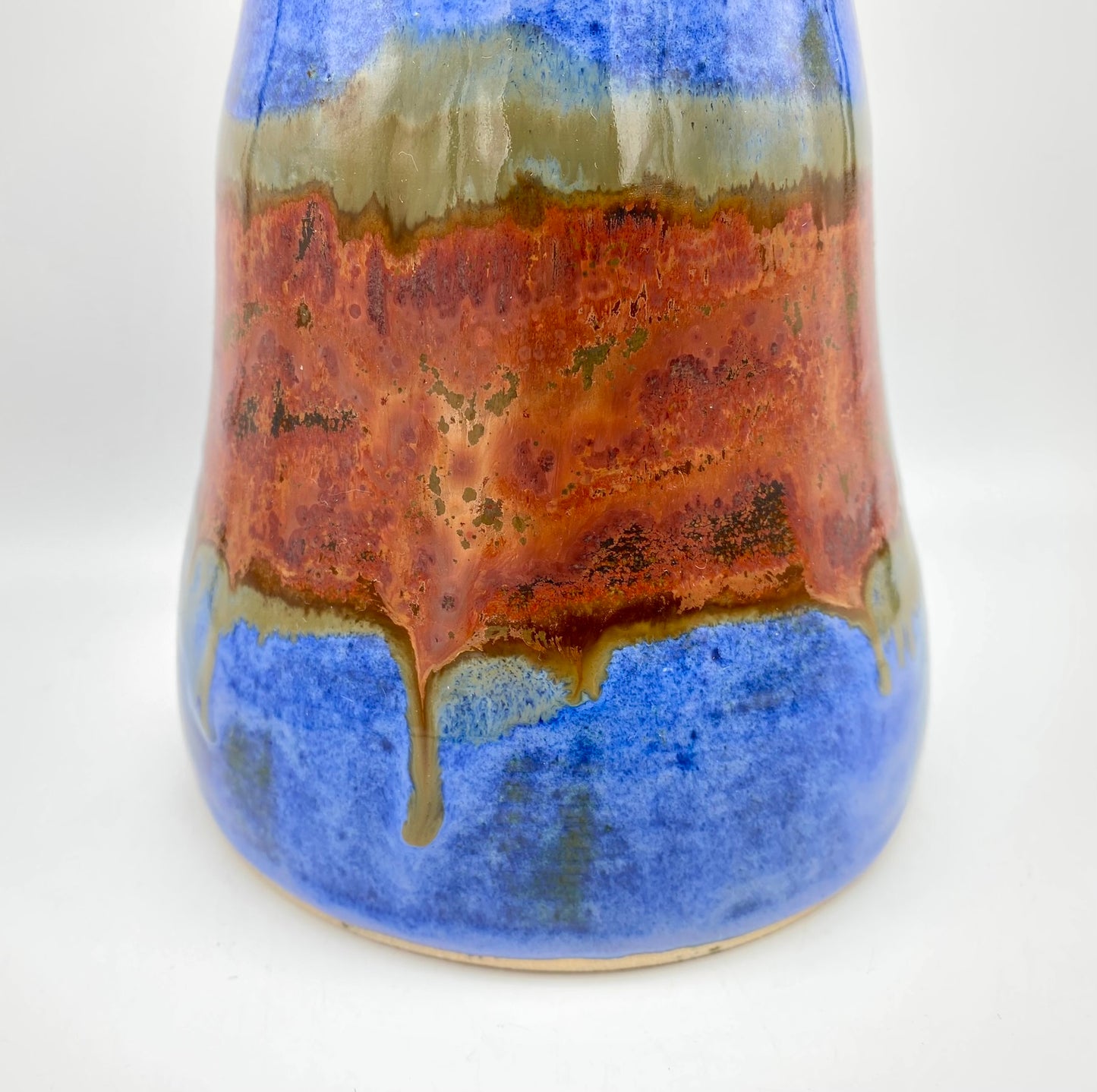 SECOND Tall lidded pot in bright blues with copper bands