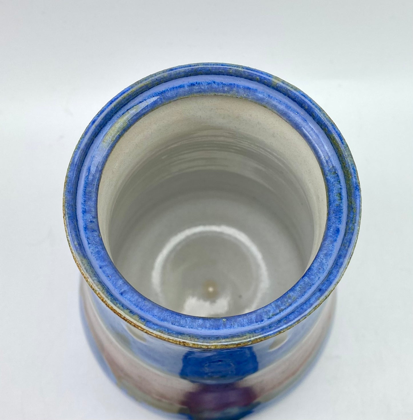 SECOND Tall lidded pot in bright blues with copper bands