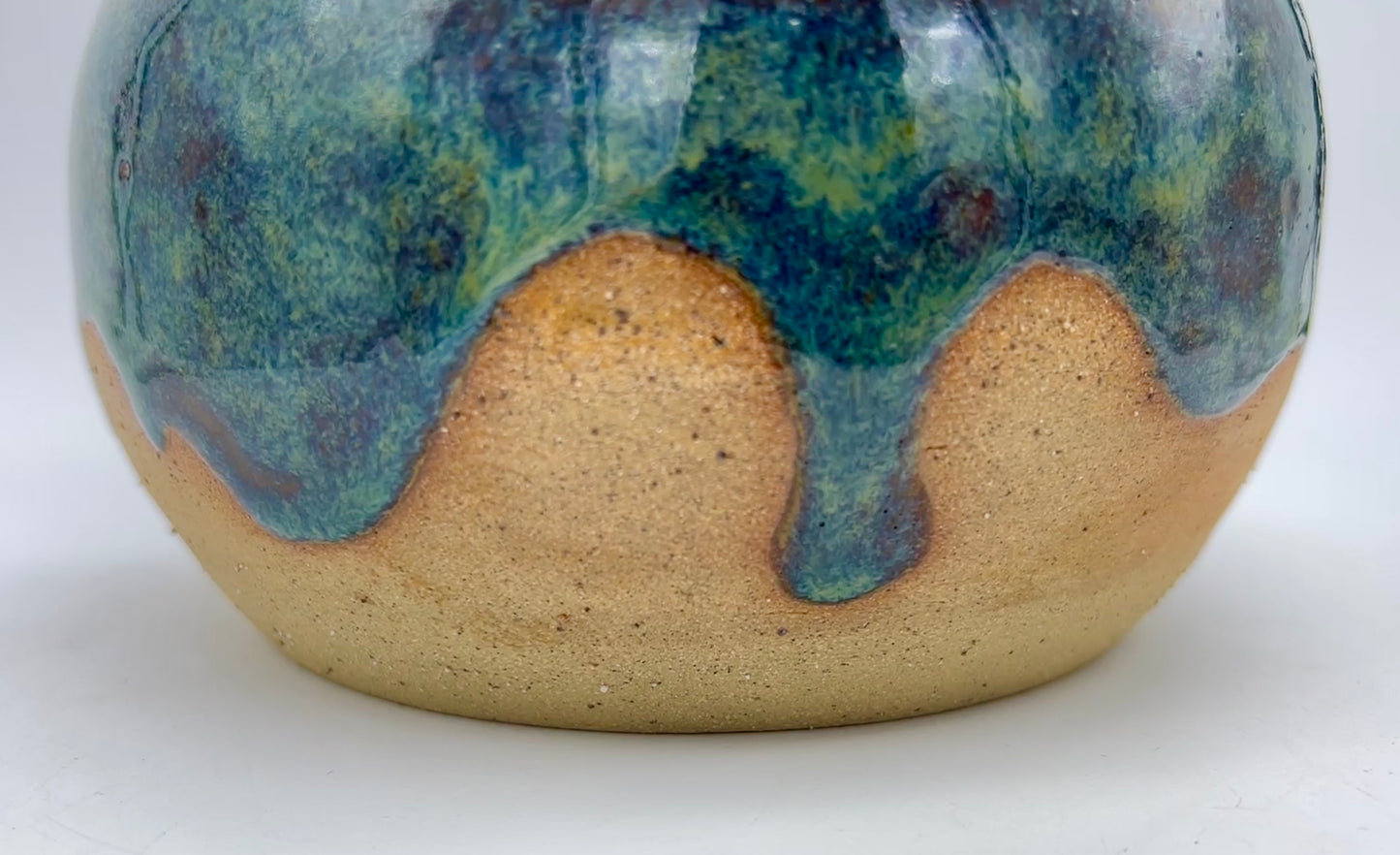 Stunning fat 'shrooms' jar in toasty clay