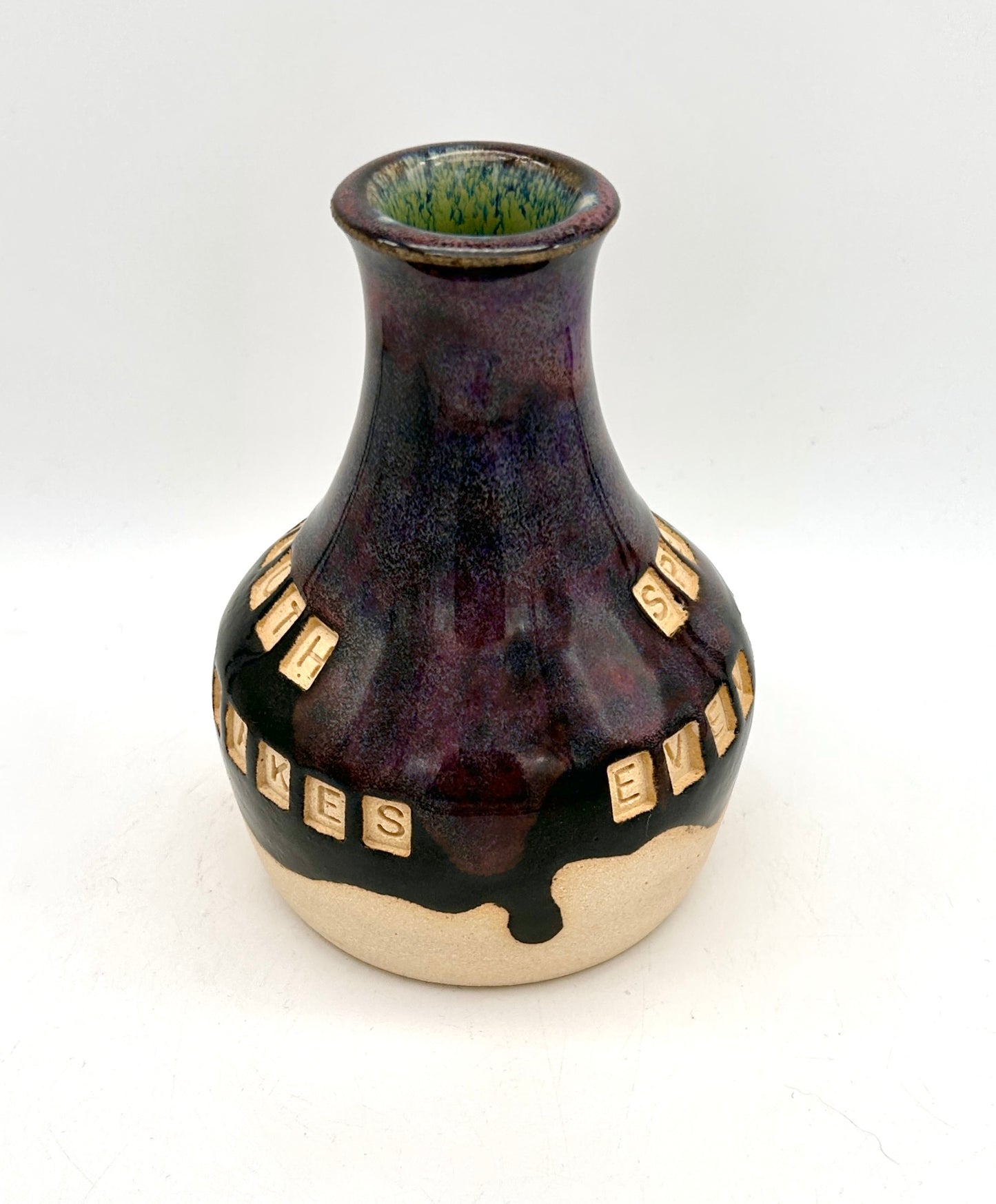 'Speak the truth, even if your voice shakes' bud vase in dark purples