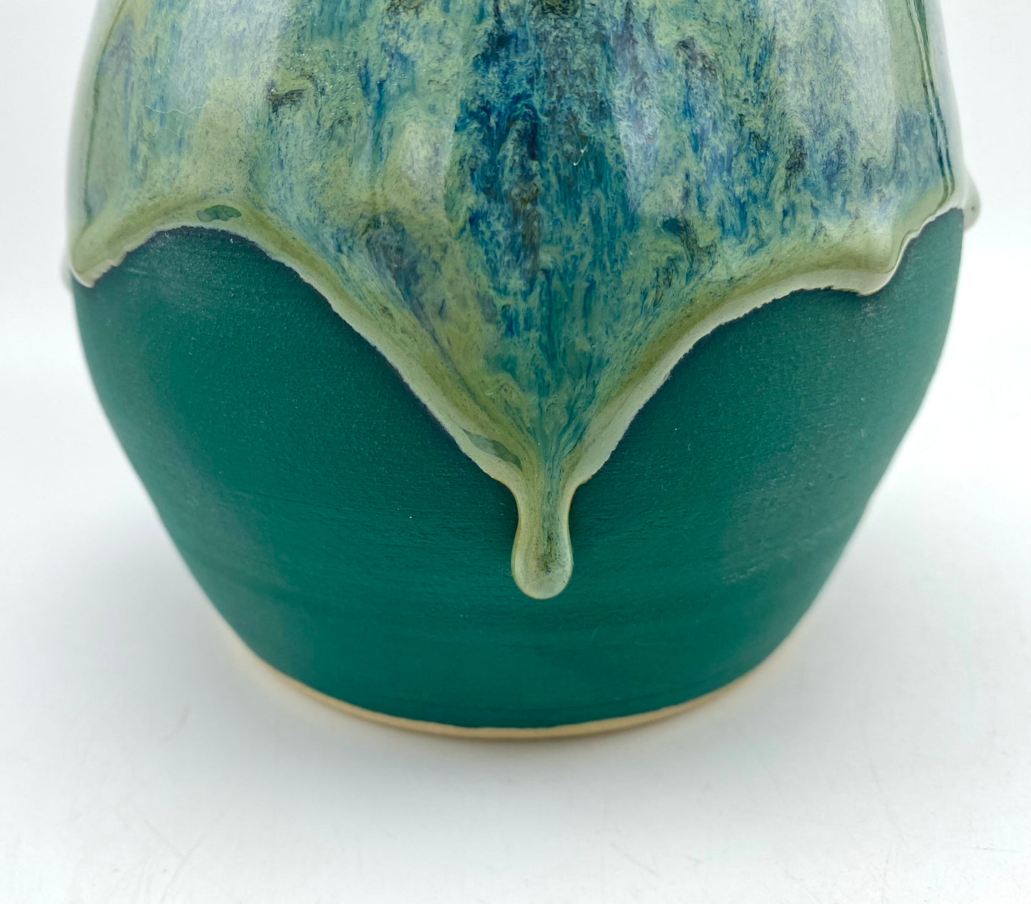 Lidded jar with stunning glaze drips and burnished copper