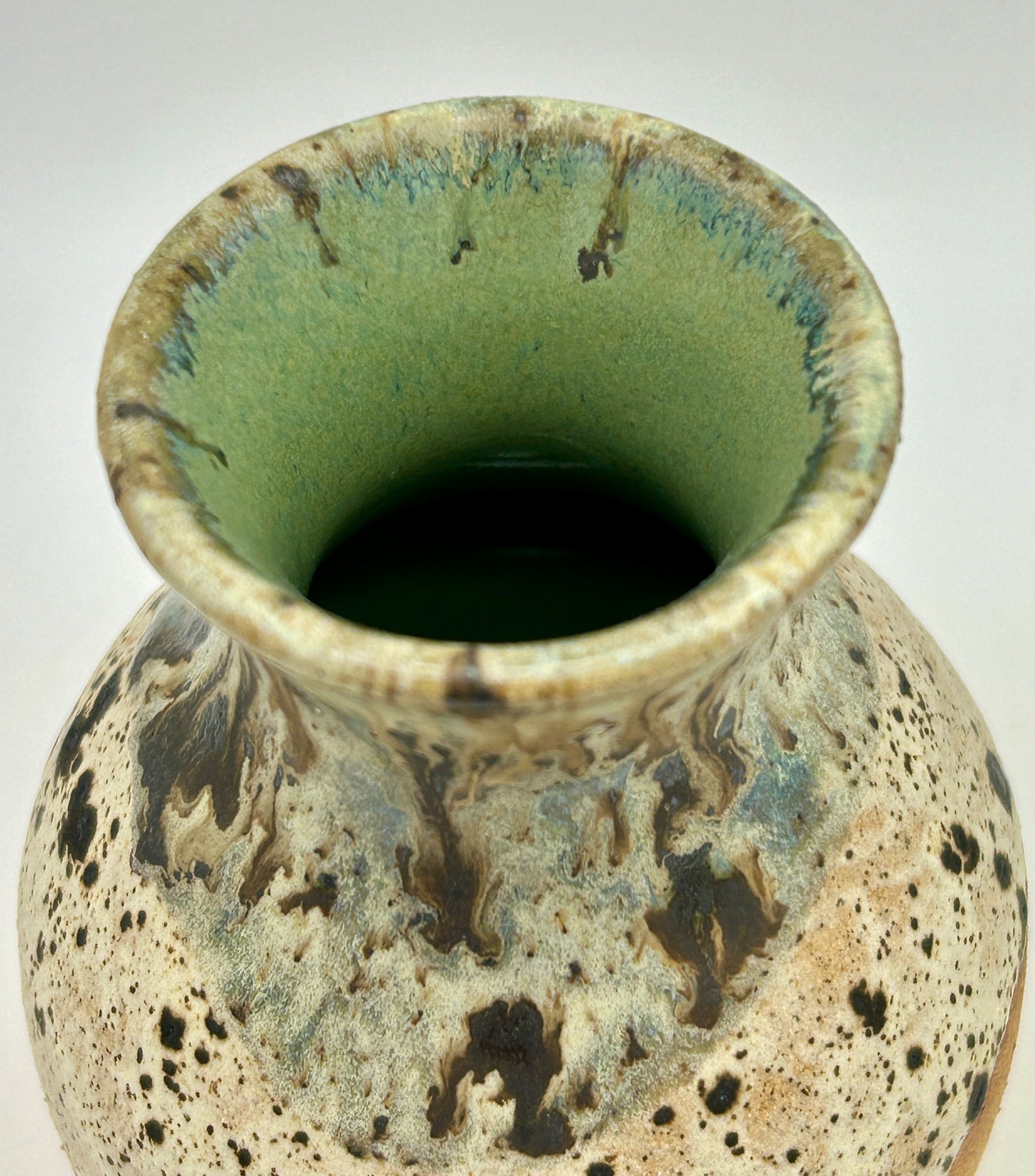 Bud vase in matte speckled creams and greens