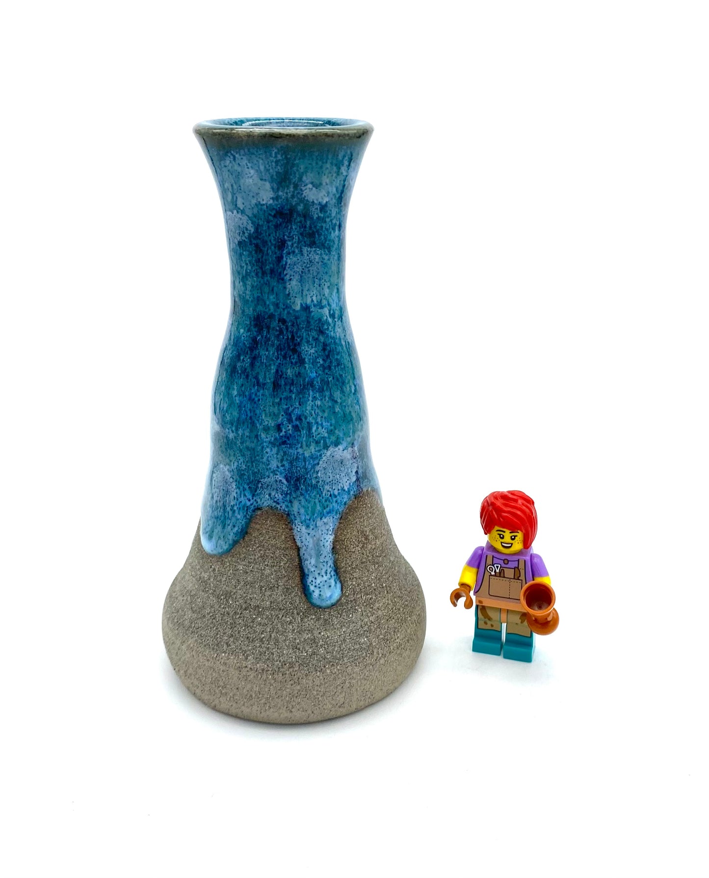 Stem vase in Scandi clay with flowing blues