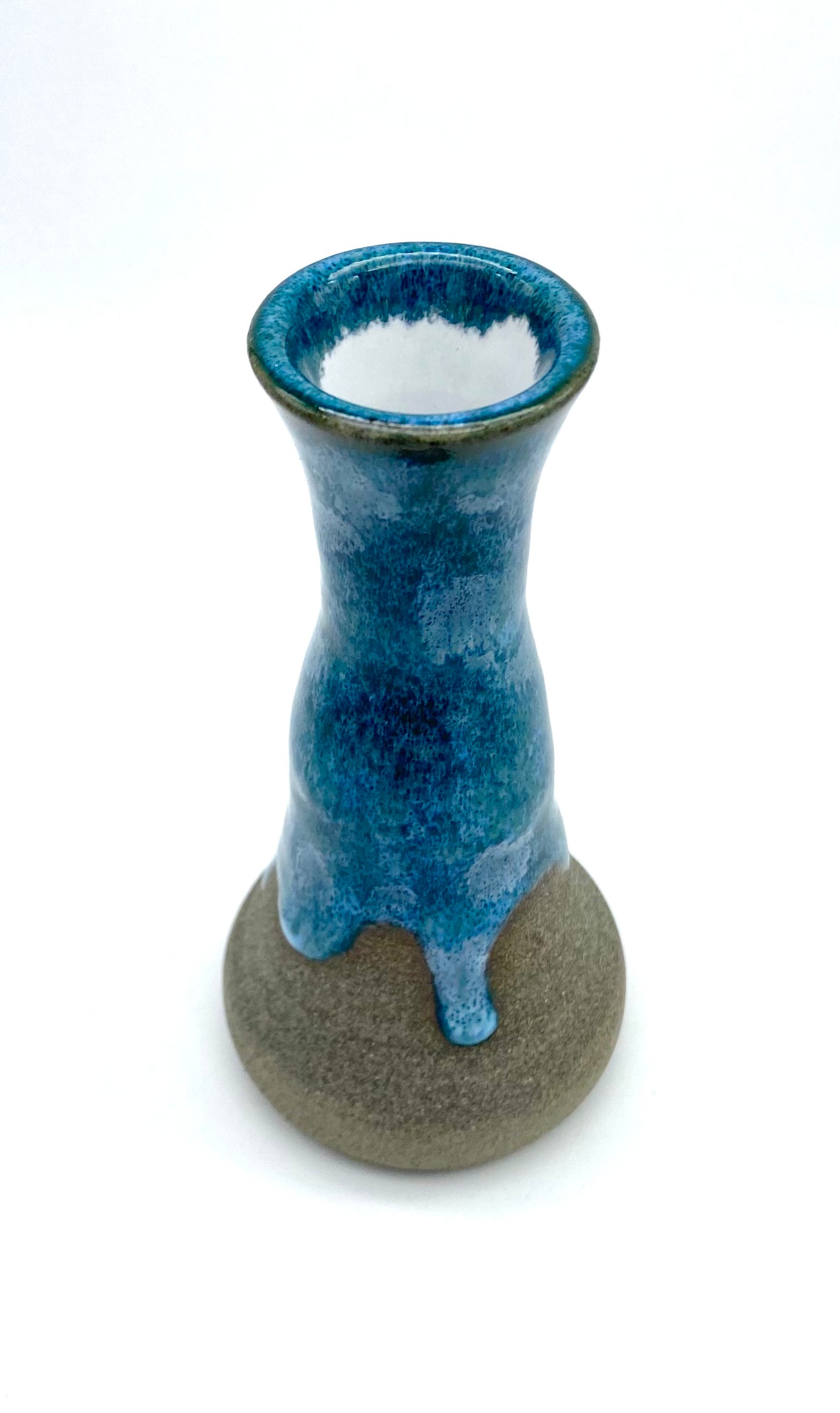 Stem vase in Scandi clay with flowing blues