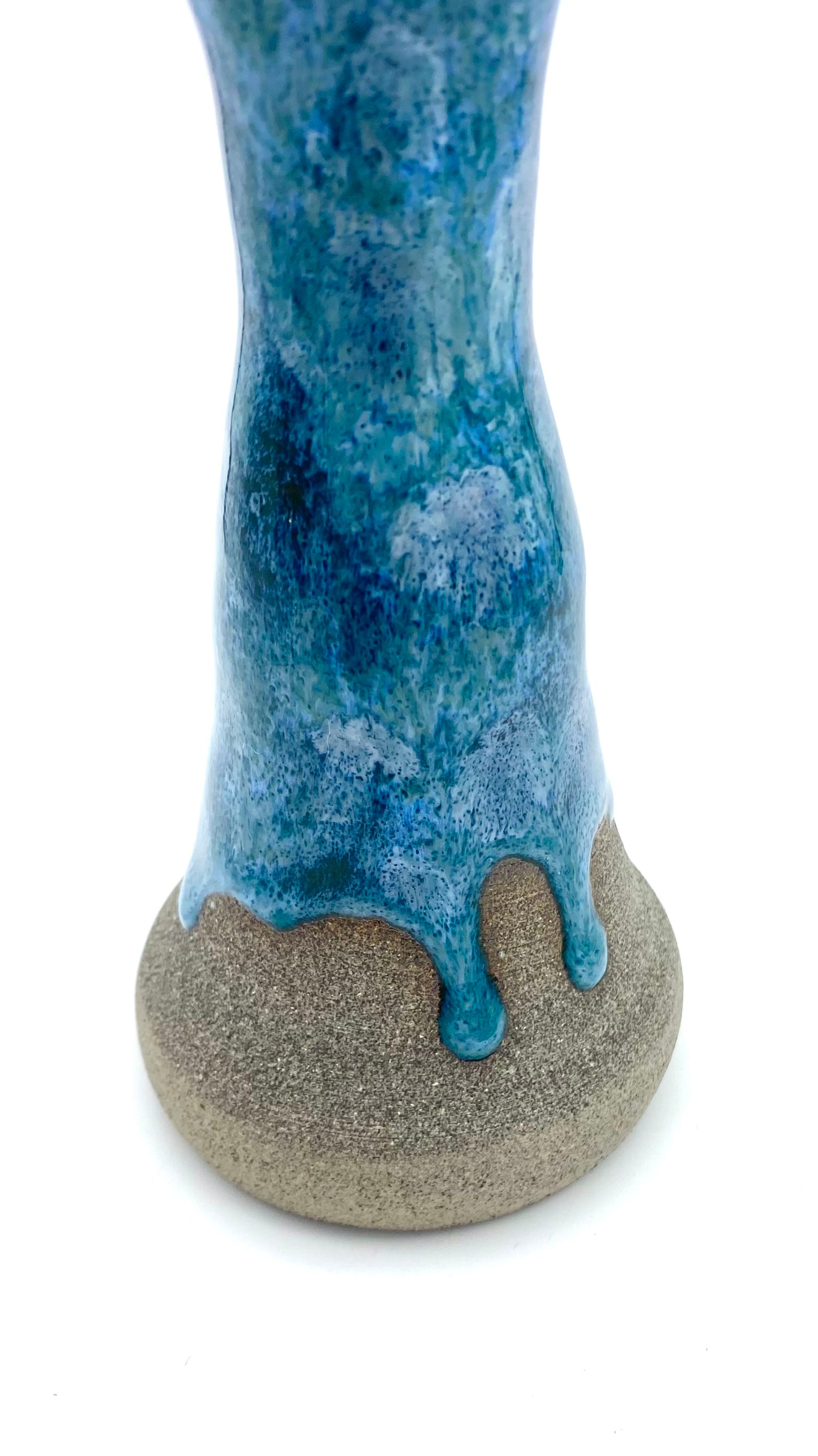 Stem vase in Scandi clay with flowing blues