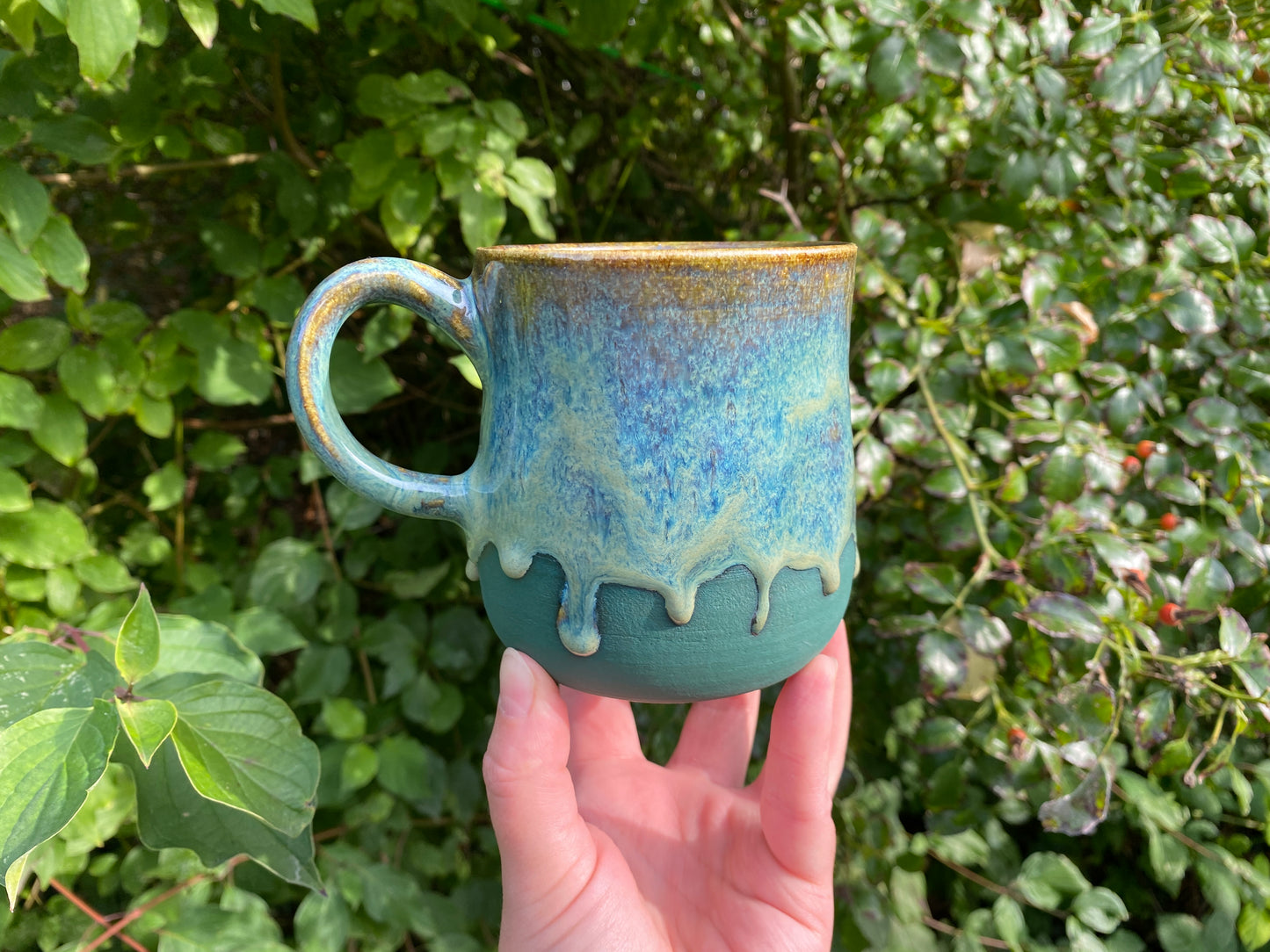 Mug in rich greens