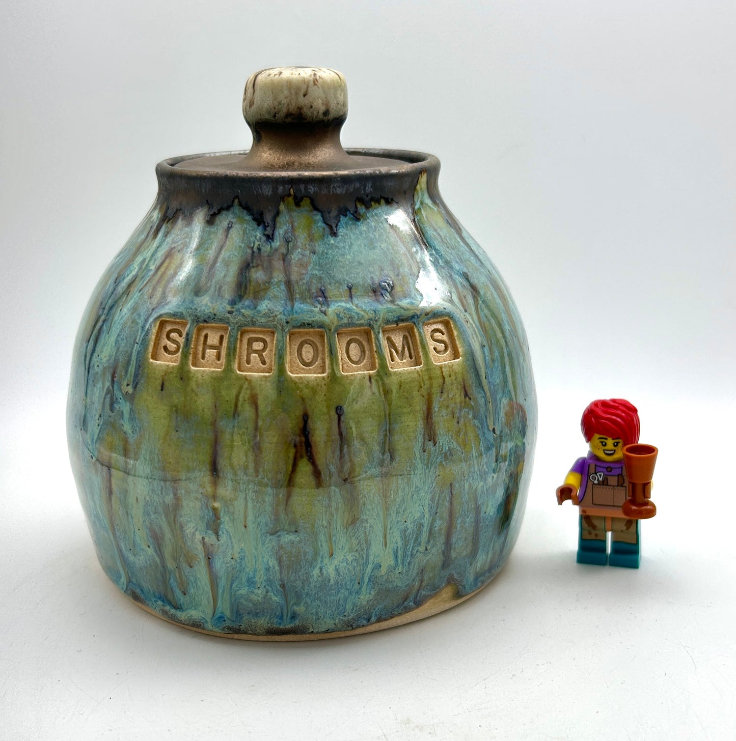 'Shrooms' lidded jar in flowing greens