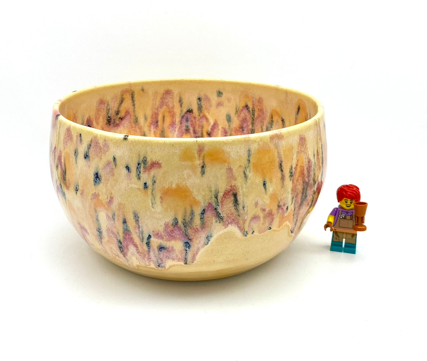 Medium bowl in creamy yellows with a fruity speckle