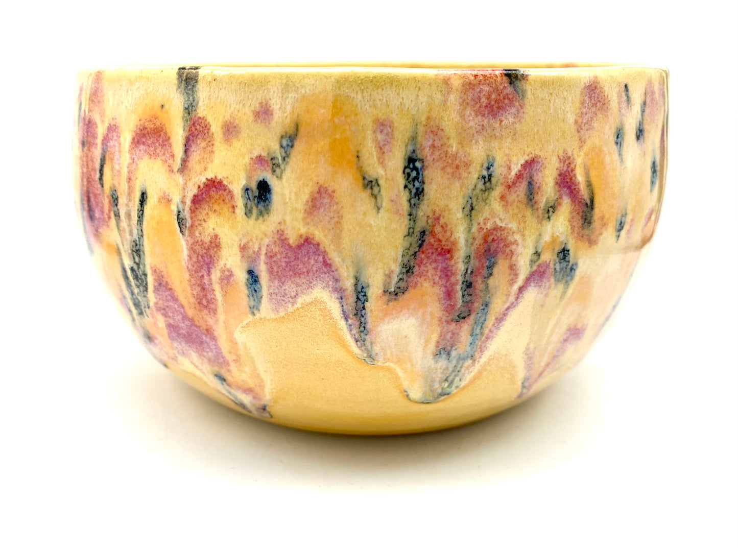 Medium bowl in creamy yellows with a fruity speckle