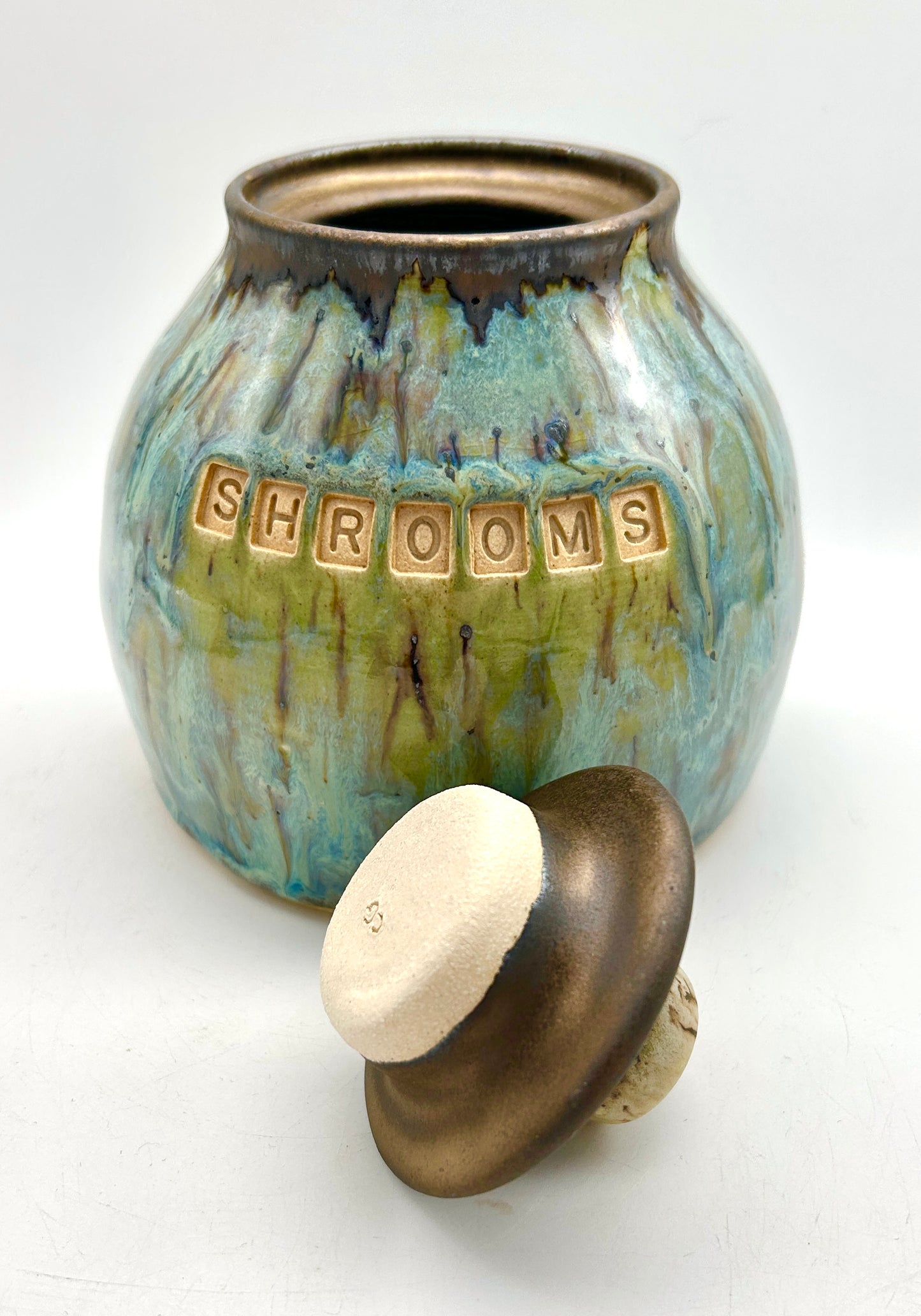'Shrooms' lidded jar in flowing greens