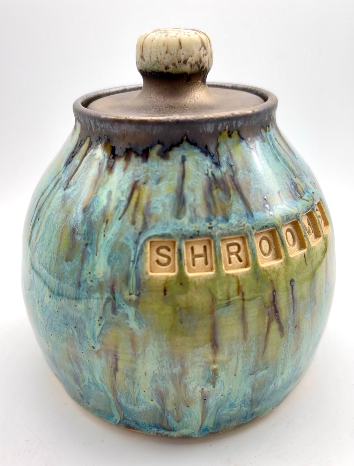 'Shrooms' lidded jar in flowing greens