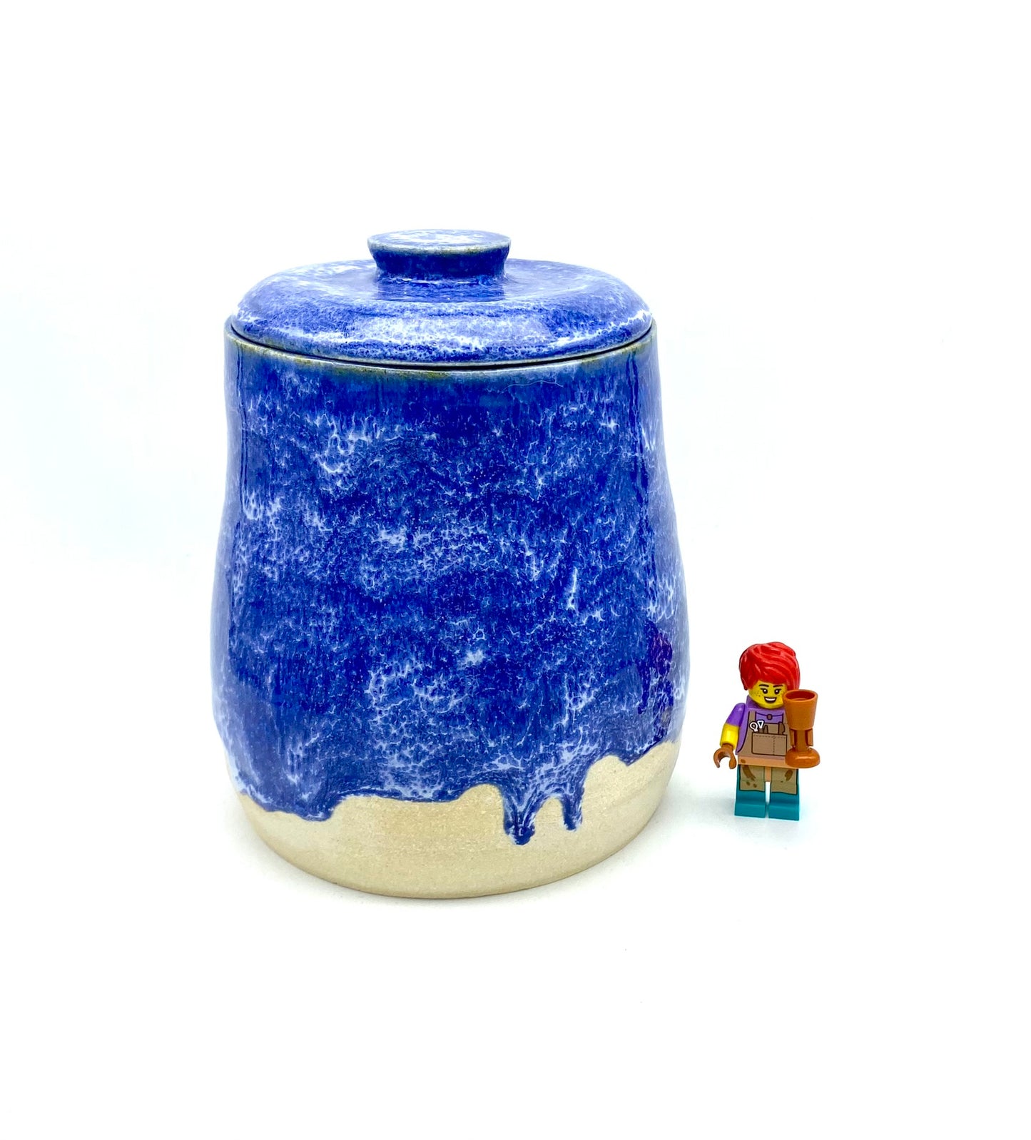 Vibrant lidded pot in mottled blues