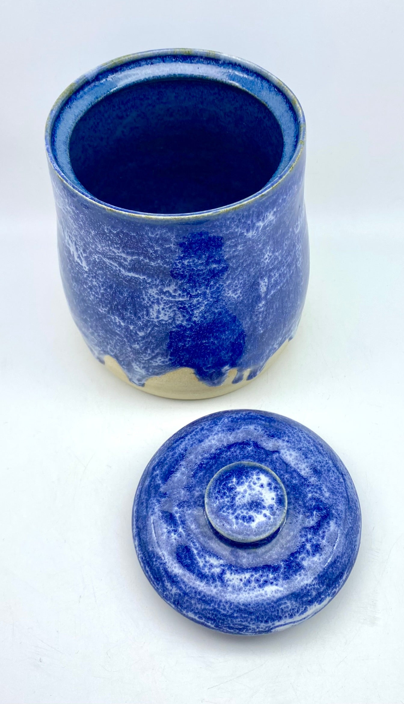 Vibrant lidded pot in mottled blues