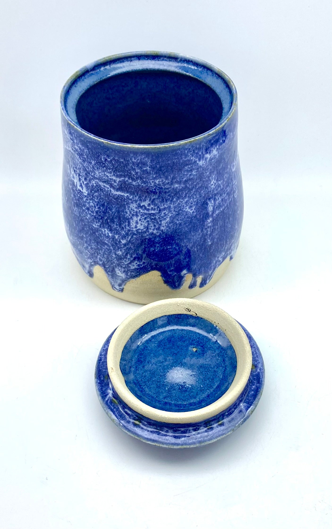 Vibrant lidded pot in mottled blues