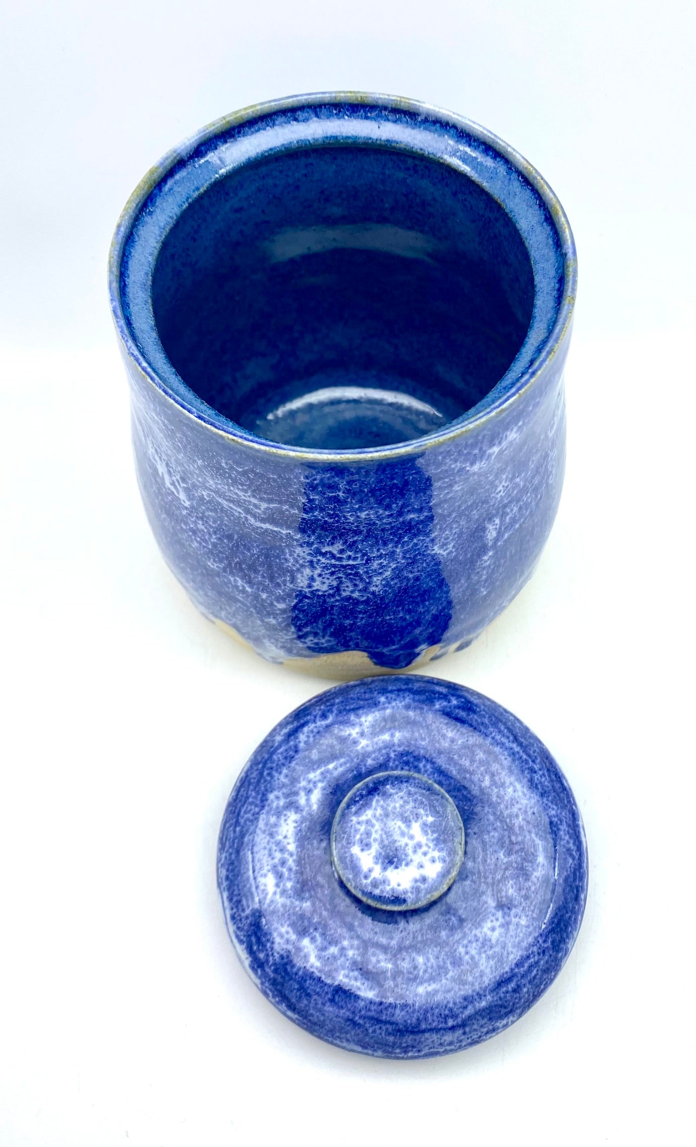 Vibrant lidded pot in mottled blues