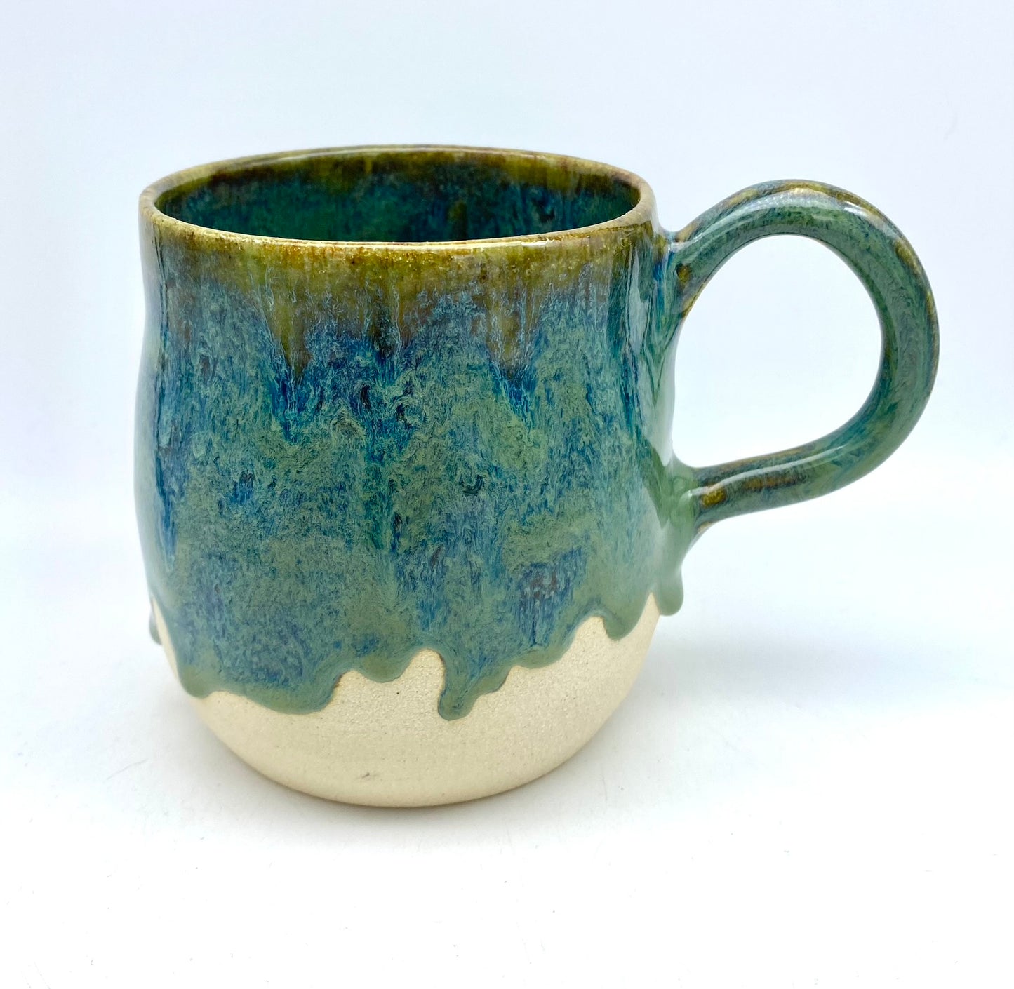 Stunning mug in velvety greens