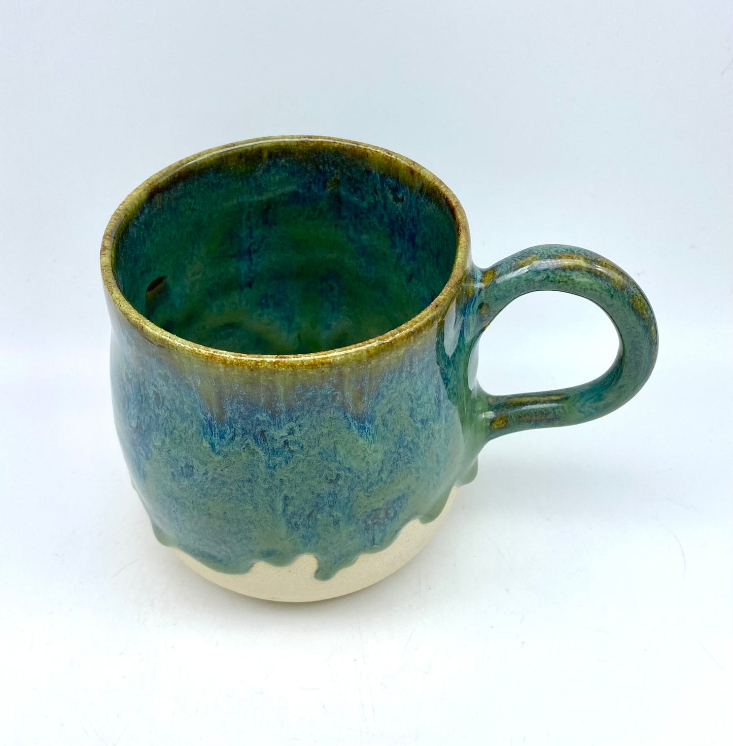 Stunning mug in velvety greens