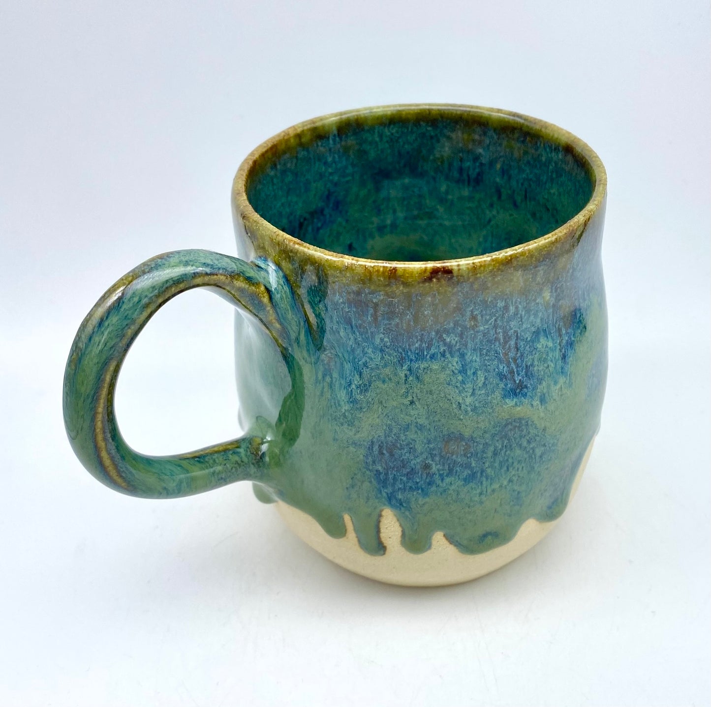 Stunning mug in velvety greens