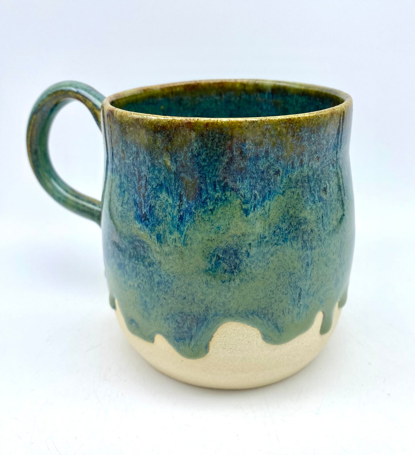 Stunning mug in velvety greens