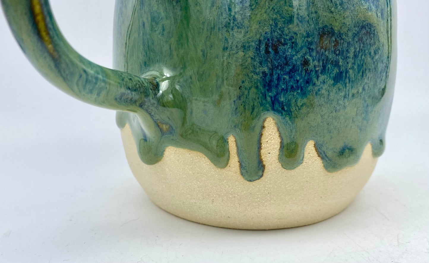 Stunning mug in velvety greens