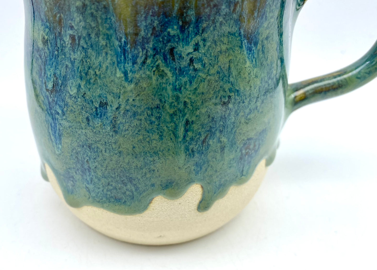 Stunning mug in velvety greens