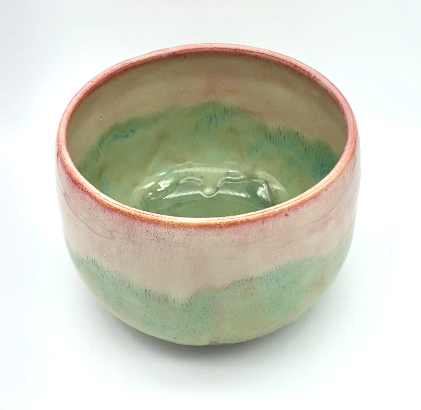 Bowl in melting pinks and greens