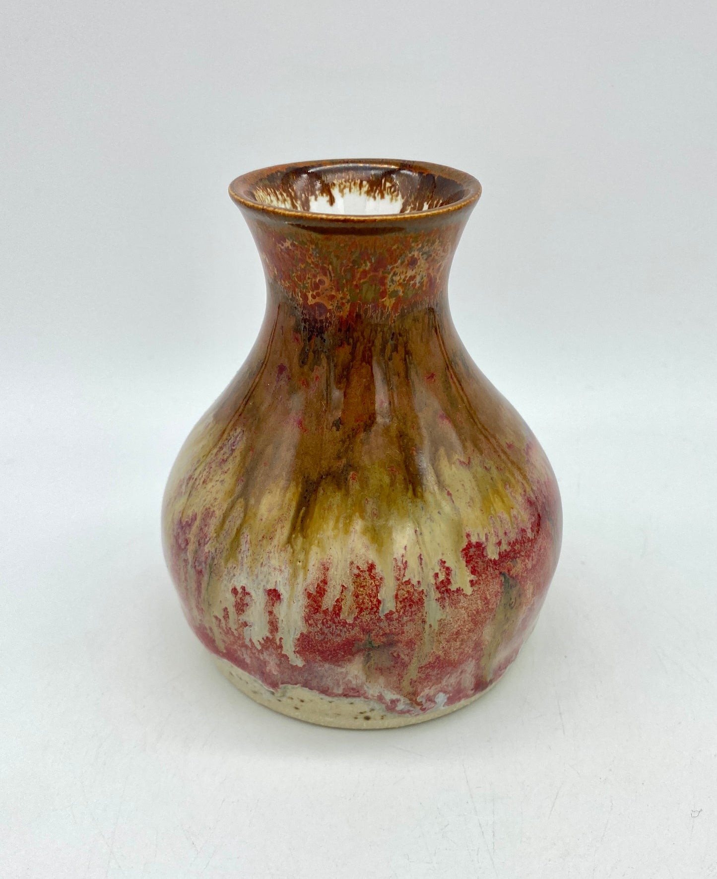 Bud vase with metallic copper flow