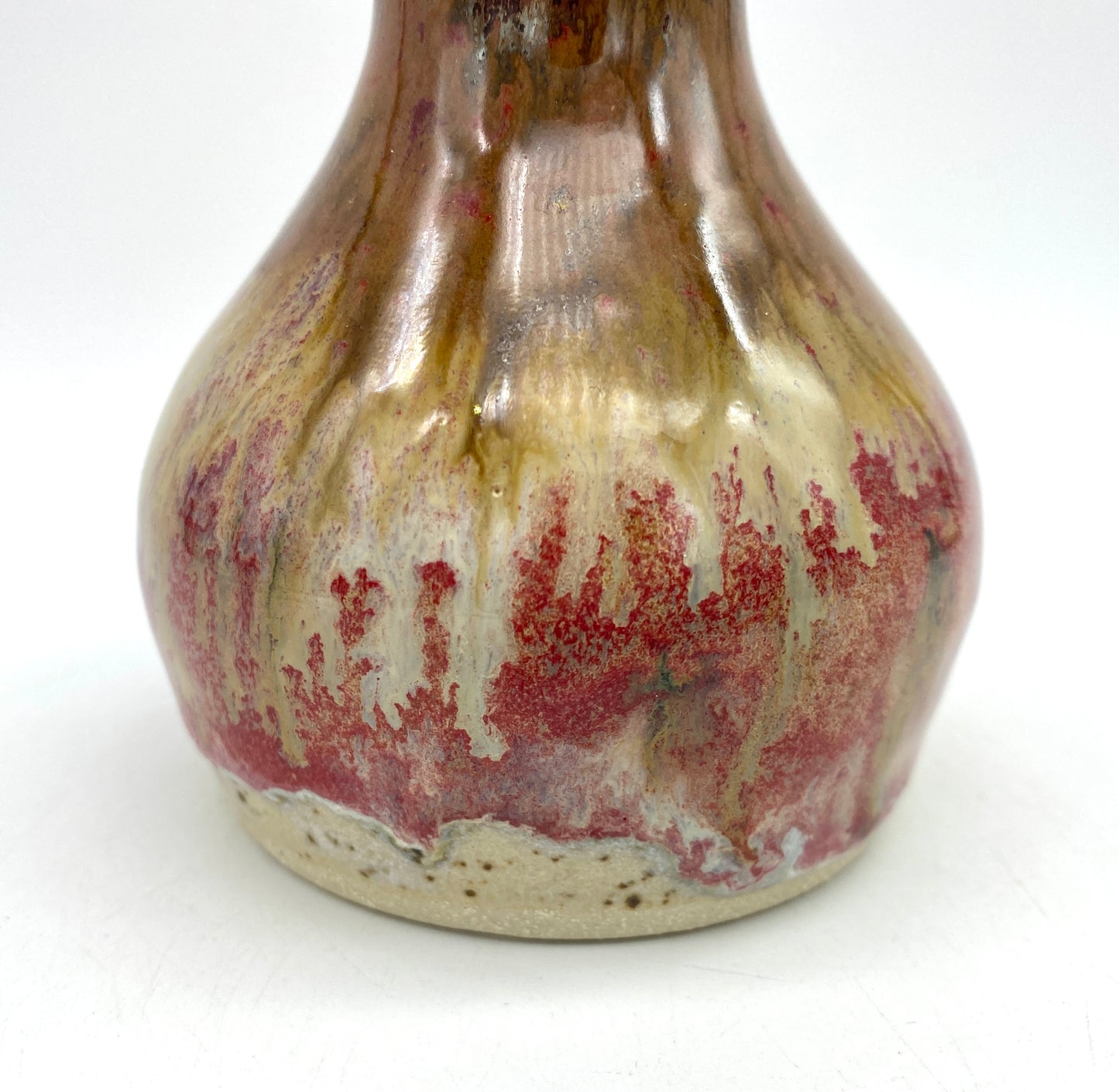 Bud vase with metallic copper flow