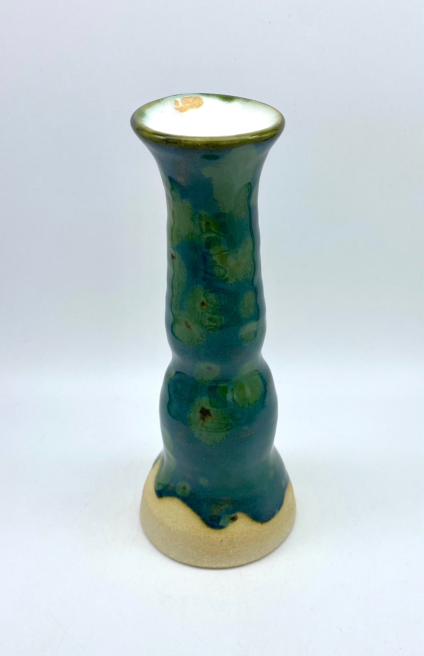 Tall candlestick or stem vase in greens