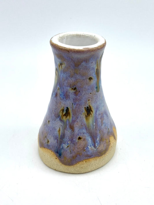 Tiny bud vase in toasty clay