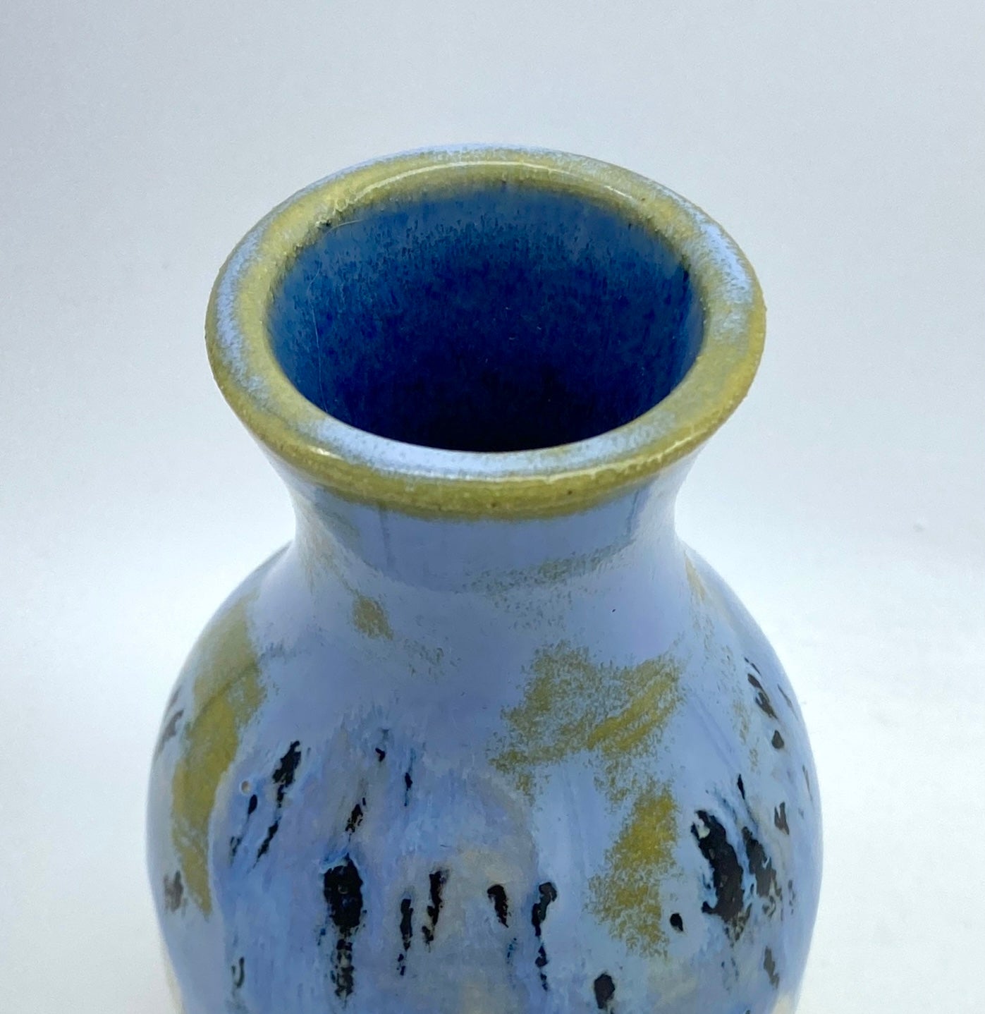 Bud vase in speckly blues and greens