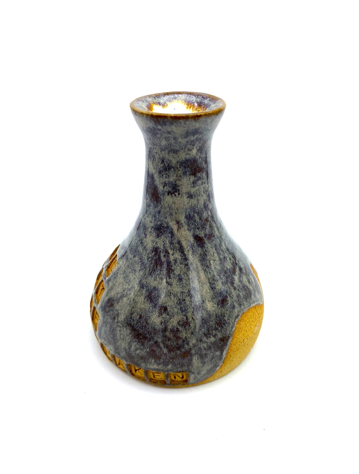 'I shall not be shaken' bud vase