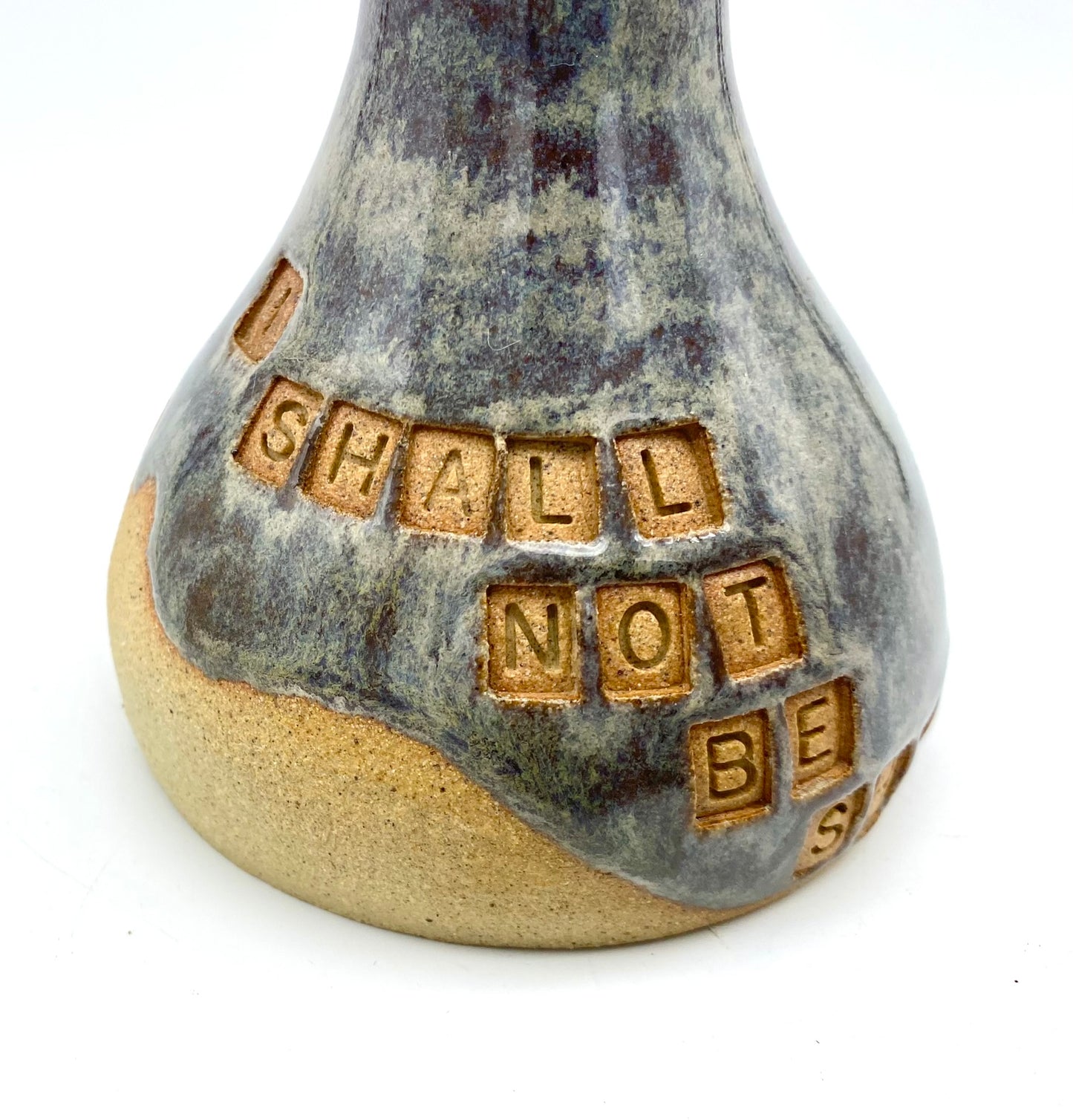 'I shall not be shaken' bud vase