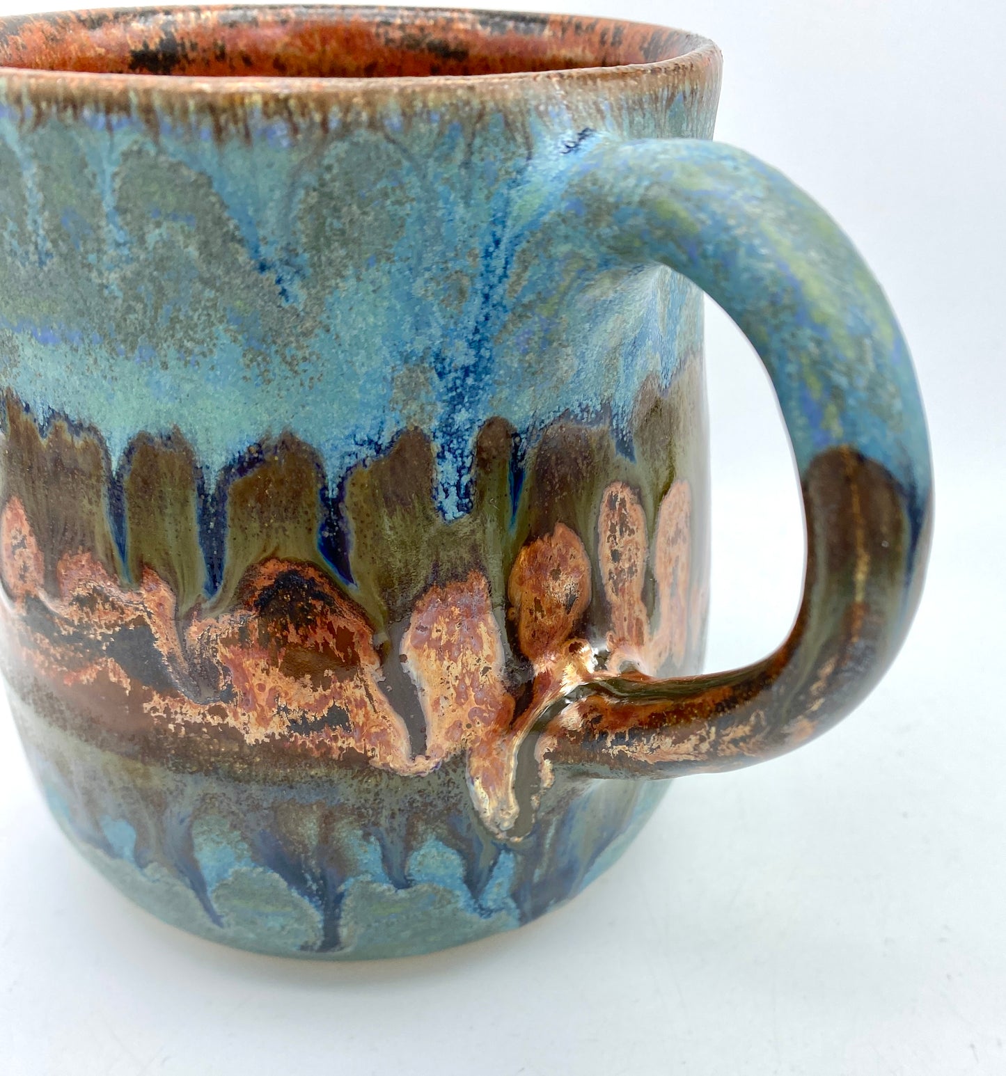 Stunning mug in blues and coppers